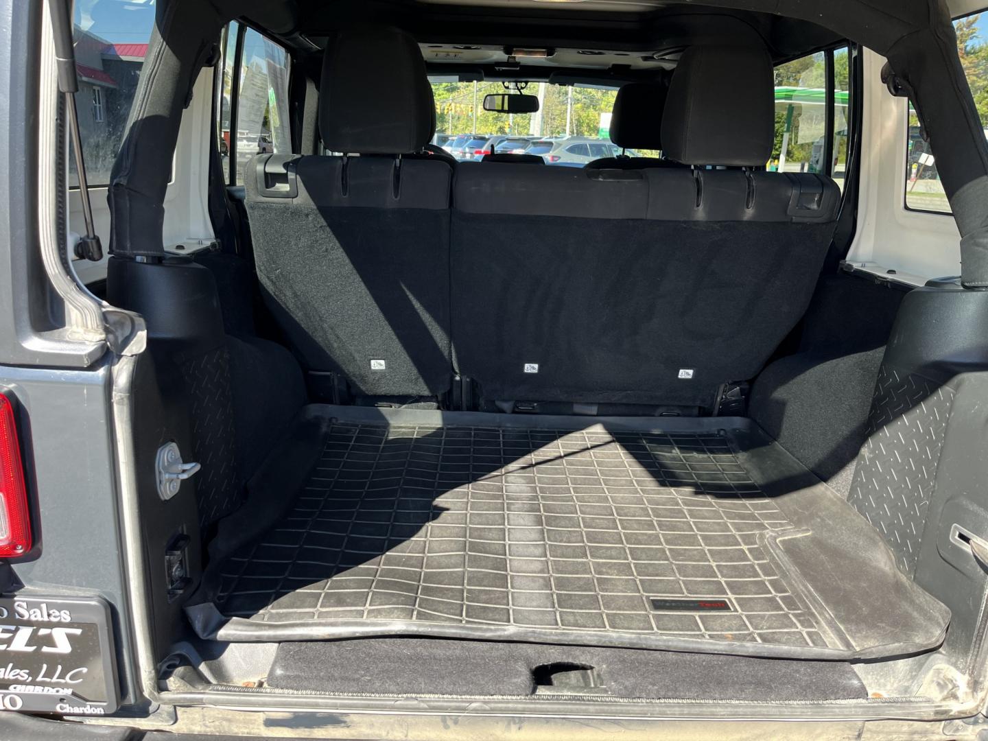 2018 Gray /Black Jeep Wrangler Unlimited Sport 4WD (1C4BJWDG3JL) with an 3.6L V6 DOHC 24V engine, Automatic transmission, located at 11115 Chardon Rd. , Chardon, OH, 44024, (440) 214-9705, 41.580246, -81.241943 - 2018 Jeep Wrangler JK Unlimited Sport 4x4 – Trail-Rated Freedom with One-Owner History This is the Jeep that still feels like a Jeep. The 2018 Wrangler JK Unlimited Sport 4x4 has the open-air character and Trail Rated capability buyers look for, with the extra room of the four-door Unlimited. Fin- Photo#14