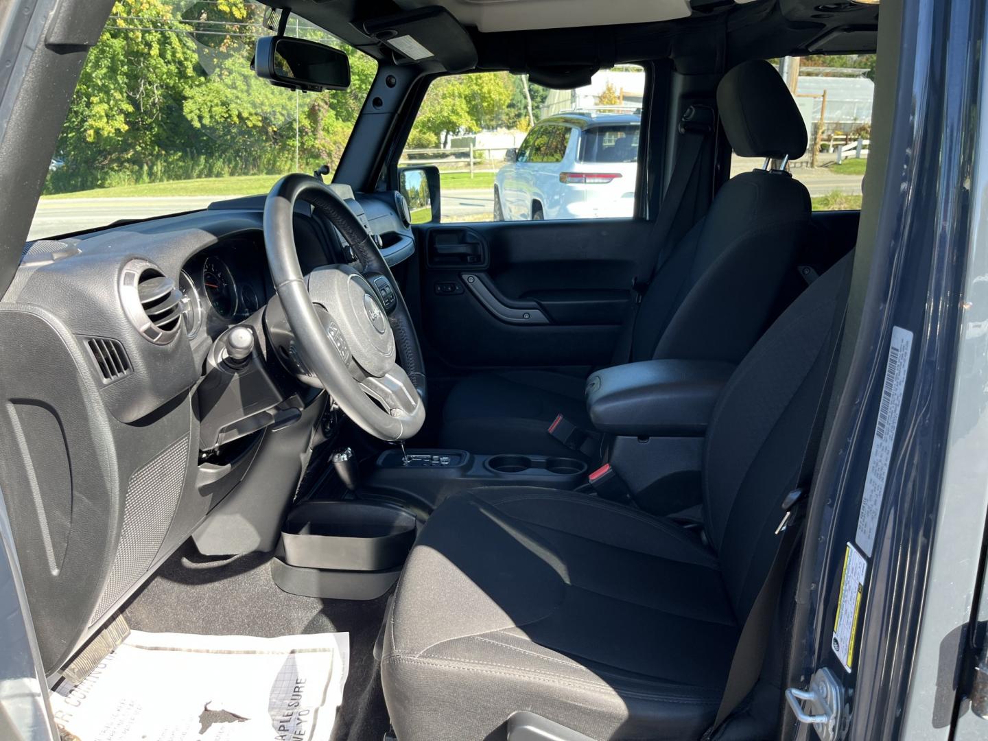 2018 Gray /Black Jeep Wrangler Unlimited Sport 4WD (1C4BJWDG3JL) with an 3.6L V6 DOHC 24V engine, Automatic transmission, located at 11115 Chardon Rd. , Chardon, OH, 44024, (440) 214-9705, 41.580246, -81.241943 - 2018 Jeep Wrangler JK Unlimited Sport 4x4 – Trail-Rated Freedom with One-Owner History This is the Jeep that still feels like a Jeep. The 2018 Wrangler JK Unlimited Sport 4x4 has the open-air character and Trail Rated capability buyers look for, with the extra room of the four-door Unlimited. Fin- Photo#15