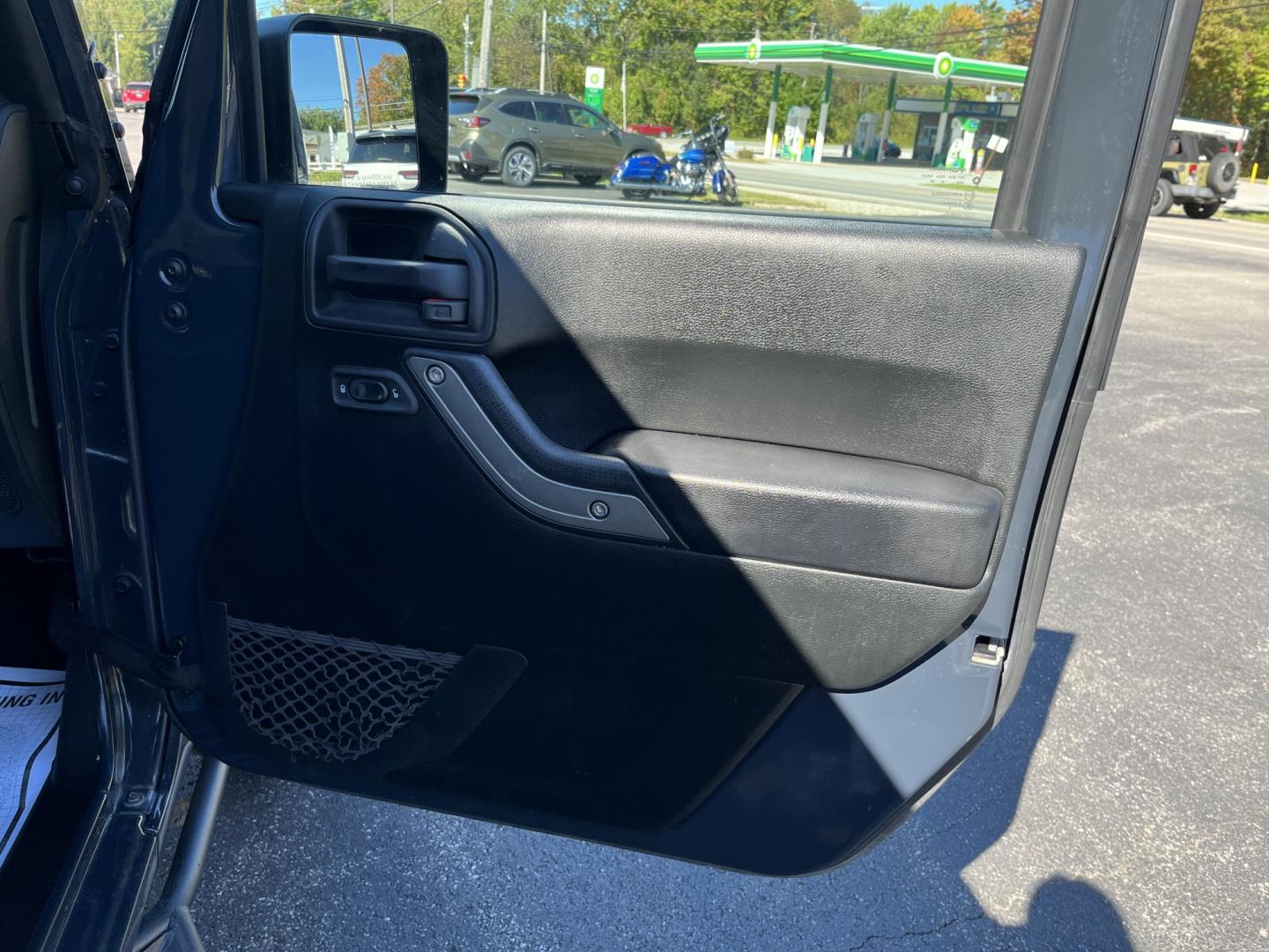 2018 Gray /Black Jeep Wrangler Unlimited Sport 4WD (1C4BJWDG3JL) with an 3.6L V6 DOHC 24V engine, Automatic transmission, located at 11115 Chardon Rd. , Chardon, OH, 44024, (440) 214-9705, 41.580246, -81.241943 - 2018 Jeep Wrangler JK Unlimited Sport 4x4 – Trail-Rated Freedom with One-Owner History This is the Jeep that still feels like a Jeep. The 2018 Wrangler JK Unlimited Sport 4x4 has the open-air character and Trail Rated capability buyers look for, with the extra room of the four-door Unlimited. Fin- Photo#33