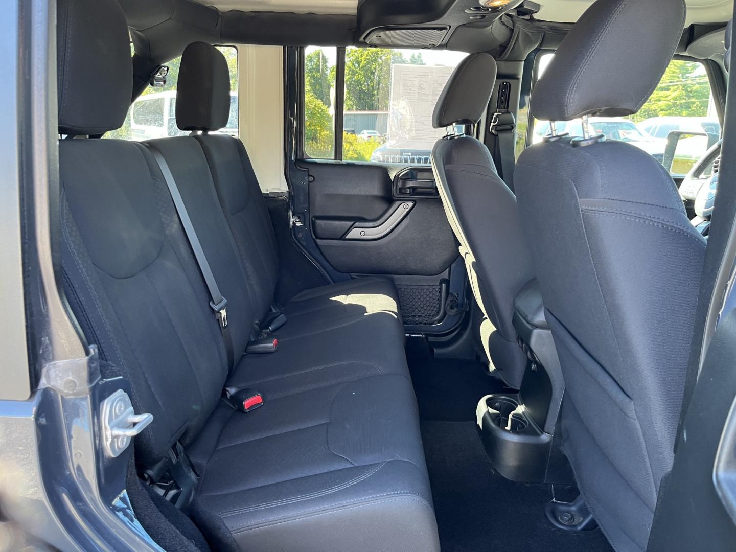 2018 Gray /Black Jeep Wrangler Unlimited Sport 4WD (1C4BJWDG3JL) with an 3.6L V6 DOHC 24V engine, Automatic transmission, located at 11115 Chardon Rd. , Chardon, OH, 44024, (440) 214-9705, 41.580246, -81.241943 - 2018 Jeep Wrangler JK Unlimited Sport 4x4 – Trail-Rated Freedom with One-Owner History This is the Jeep that still feels like a Jeep. The 2018 Wrangler JK Unlimited Sport 4x4 has the open-air character and Trail Rated capability buyers look for, with the extra room of the four-door Unlimited. Fin- Photo#32