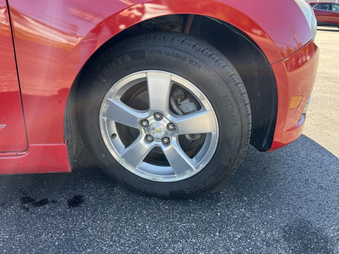 2013 Red /Black Chevrolet Cruze 1LT Auto (1G1PC5SBXD7) with an 1.4L I4 DOHC 16V TURBO engine, Automatic transmission, located at 11115 Chardon Rd. , Chardon, OH, 44024, (440) 214-9705, 41.580246, -81.241943 - 2013 Chevrolet Cruze LT – Efficient Compact Sedan with Everyday Convenience If you want a smaller sedan that is easy on fuel and easy to live with, this 2013 Chevrolet Cruze LT is a practical choice. The 1.4L Turbocharged EcoTec engine and 6-speed automatic deliver smooth everyday power and a str- Photo#4