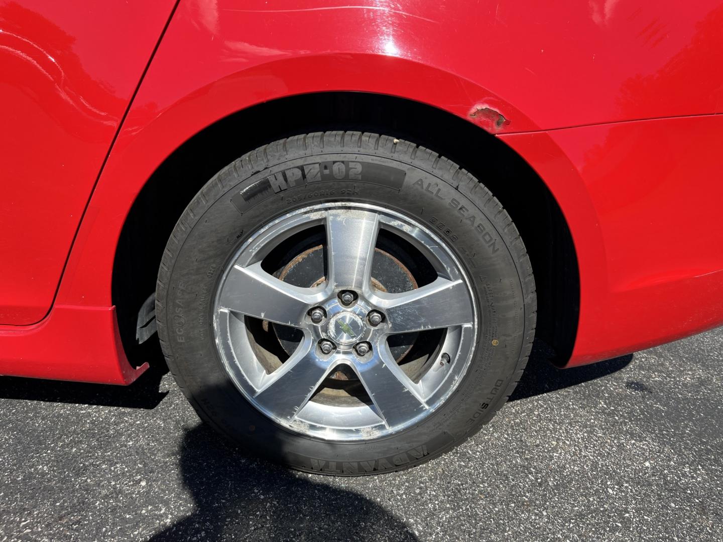 2013 Red /Black Chevrolet Cruze 1LT Auto (1G1PC5SBXD7) with an 1.4L I4 DOHC 16V TURBO engine, Automatic transmission, located at 11115 Chardon Rd. , Chardon, OH, 44024, (440) 214-9705, 41.580246, -81.241943 - 2013 Chevrolet Cruze LT – Efficient Compact Sedan with Everyday Convenience If you want a smaller sedan that is easy on fuel and easy to live with, this 2013 Chevrolet Cruze LT is a practical choice. The 1.4L Turbocharged EcoTec engine and 6-speed automatic deliver smooth everyday power and a str- Photo#10