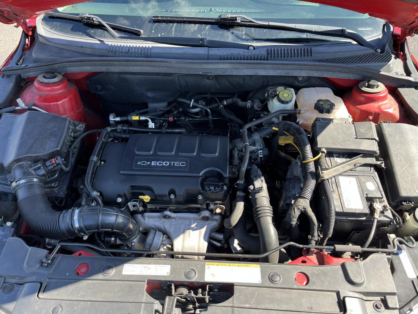 2013 Red /Black Chevrolet Cruze 1LT Auto (1G1PC5SBXD7) with an 1.4L I4 DOHC 16V TURBO engine, Automatic transmission, located at 11115 Chardon Rd. , Chardon, OH, 44024, (440) 214-9705, 41.580246, -81.241943 - 2013 Chevrolet Cruze LT – Efficient Compact Sedan with Everyday Convenience If you want a smaller sedan that is easy on fuel and easy to live with, this 2013 Chevrolet Cruze LT is a practical choice. The 1.4L Turbocharged EcoTec engine and 6-speed automatic deliver smooth everyday power and a str- Photo#13