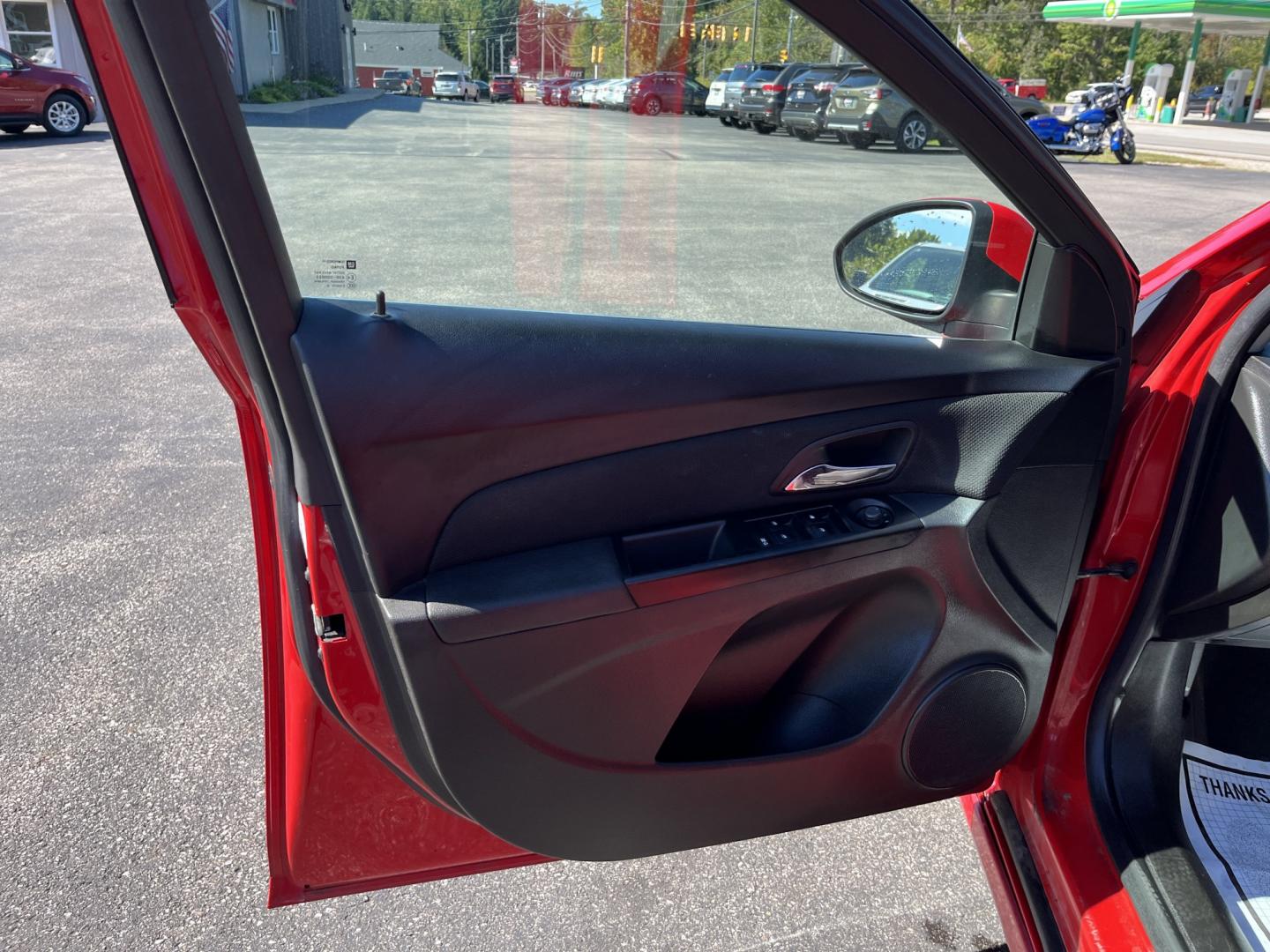 2013 Red /Black Chevrolet Cruze 1LT Auto (1G1PC5SBXD7) with an 1.4L I4 DOHC 16V TURBO engine, Automatic transmission, located at 11115 Chardon Rd. , Chardon, OH, 44024, (440) 214-9705, 41.580246, -81.241943 - 2013 Chevrolet Cruze LT – Efficient Compact Sedan with Everyday Convenience If you want a smaller sedan that is easy on fuel and easy to live with, this 2013 Chevrolet Cruze LT is a practical choice. The 1.4L Turbocharged EcoTec engine and 6-speed automatic deliver smooth everyday power and a str- Photo#15