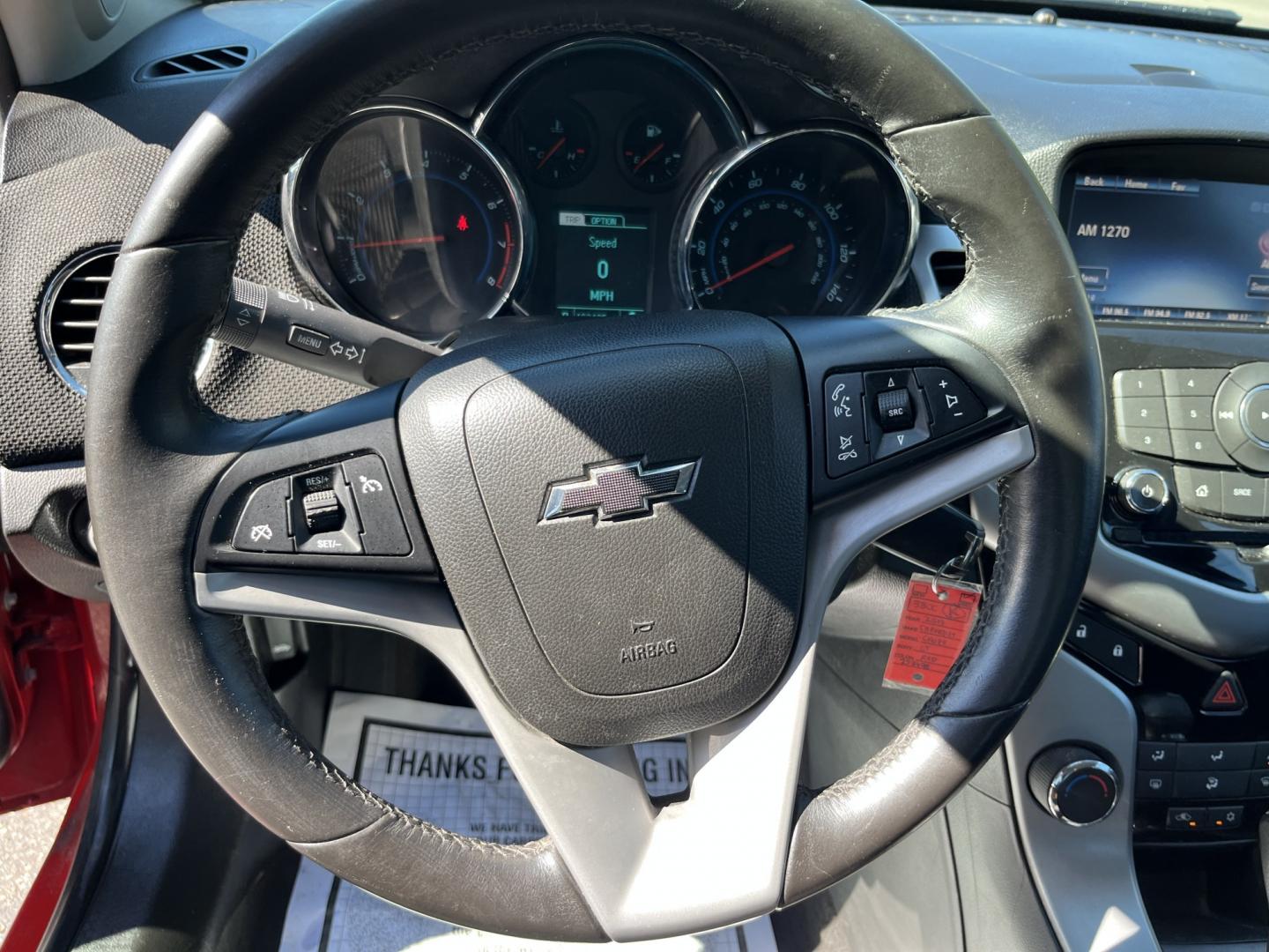 2013 Red /Black Chevrolet Cruze 1LT Auto (1G1PC5SBXD7) with an 1.4L I4 DOHC 16V TURBO engine, Automatic transmission, located at 11115 Chardon Rd. , Chardon, OH, 44024, (440) 214-9705, 41.580246, -81.241943 - 2013 Chevrolet Cruze LT – Efficient Compact Sedan with Everyday Convenience If you want a smaller sedan that is easy on fuel and easy to live with, this 2013 Chevrolet Cruze LT is a practical choice. The 1.4L Turbocharged EcoTec engine and 6-speed automatic deliver smooth everyday power and a str- Photo#20