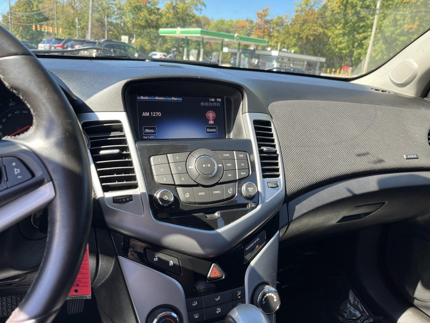 2013 Red /Black Chevrolet Cruze 1LT Auto (1G1PC5SBXD7) with an 1.4L I4 DOHC 16V TURBO engine, Automatic transmission, located at 11115 Chardon Rd. , Chardon, OH, 44024, (440) 214-9705, 41.580246, -81.241943 - 2013 Chevrolet Cruze LT – Efficient Compact Sedan with Everyday Convenience If you want a smaller sedan that is easy on fuel and easy to live with, this 2013 Chevrolet Cruze LT is a practical choice. The 1.4L Turbocharged EcoTec engine and 6-speed automatic deliver smooth everyday power and a str- Photo#24