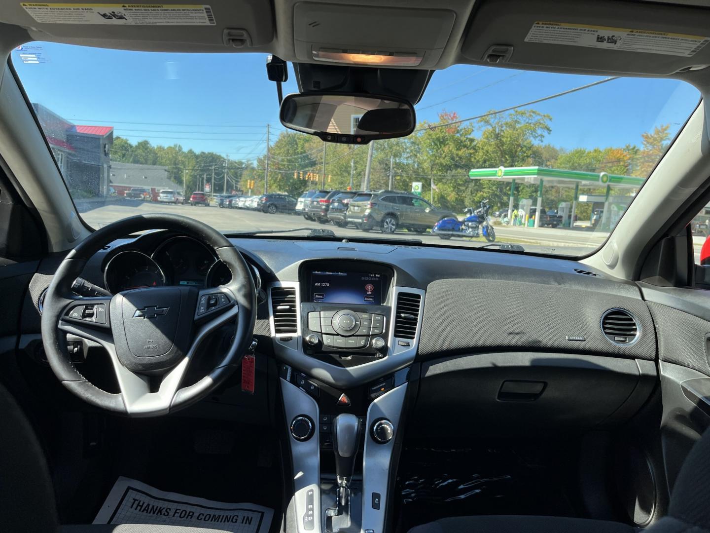 2013 Red /Black Chevrolet Cruze 1LT Auto (1G1PC5SBXD7) with an 1.4L I4 DOHC 16V TURBO engine, Automatic transmission, located at 11115 Chardon Rd. , Chardon, OH, 44024, (440) 214-9705, 41.580246, -81.241943 - 2013 Chevrolet Cruze LT – Efficient Compact Sedan with Everyday Convenience If you want a smaller sedan that is easy on fuel and easy to live with, this 2013 Chevrolet Cruze LT is a practical choice. The 1.4L Turbocharged EcoTec engine and 6-speed automatic deliver smooth everyday power and a str- Photo#31