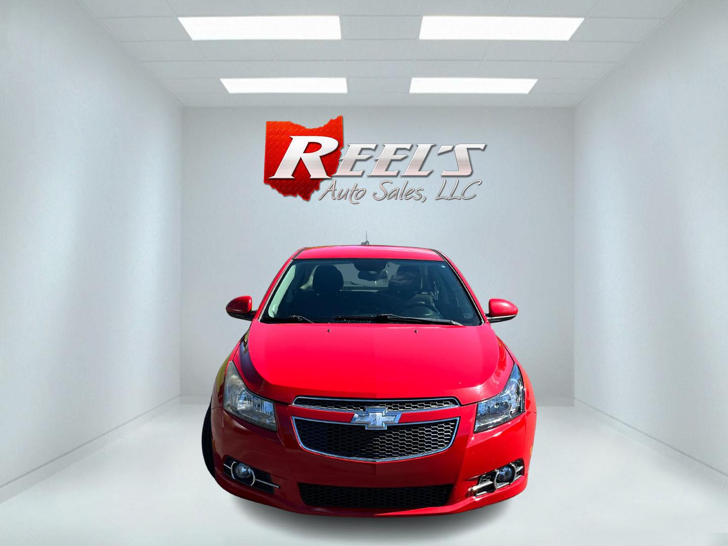 2013 Red /Black Chevrolet Cruze 1LT Auto (1G1PC5SBXD7) with an 1.4L I4 DOHC 16V TURBO engine, Automatic transmission, located at 11115 Chardon Rd. , Chardon, OH, 44024, (440) 214-9705, 41.580246, -81.241943 - 2013 Chevrolet Cruze LT – Efficient Compact Sedan with Everyday Convenience If you want a smaller sedan that is easy on fuel and easy to live with, this 2013 Chevrolet Cruze LT is a practical choice. The 1.4L Turbocharged EcoTec engine and 6-speed automatic deliver smooth everyday power and a str- Photo#1
