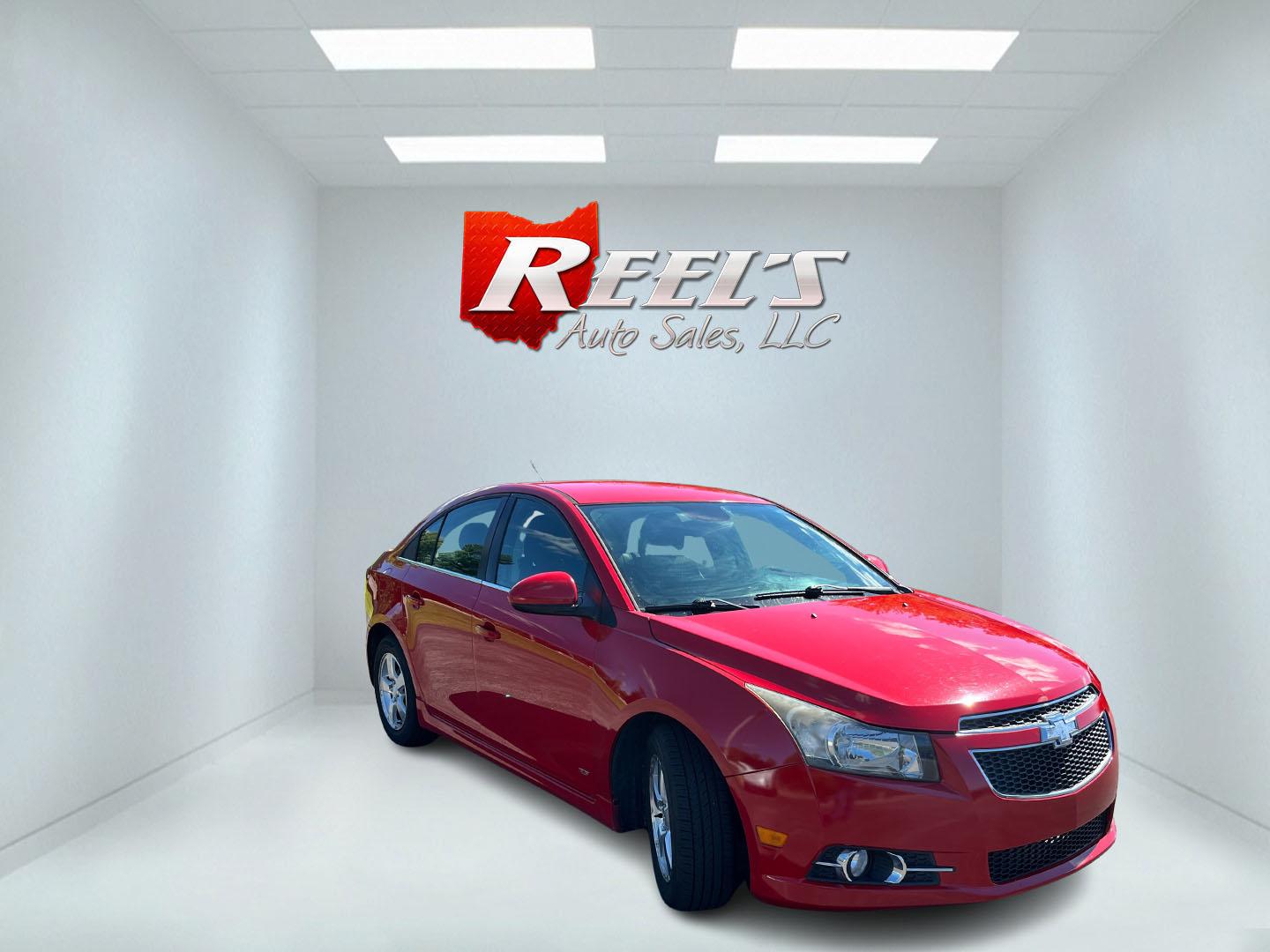 2013 Red /Black Chevrolet Cruze 1LT Auto (1G1PC5SBXD7) with an 1.4L I4 DOHC 16V TURBO engine, Automatic transmission, located at 11115 Chardon Rd. , Chardon, OH, 44024, (440) 214-9705, 41.580246, -81.241943 - 2013 Chevrolet Cruze LT – Efficient Compact Sedan with Everyday Convenience If you want a smaller sedan that is easy on fuel and easy to live with, this 2013 Chevrolet Cruze LT is a practical choice. The 1.4L Turbocharged EcoTec engine and 6-speed automatic deliver smooth everyday power and a str- Photo#2
