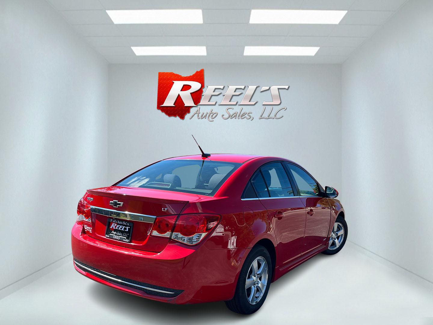 2013 Red /Black Chevrolet Cruze 1LT Auto (1G1PC5SBXD7) with an 1.4L I4 DOHC 16V TURBO engine, Automatic transmission, located at 11115 Chardon Rd. , Chardon, OH, 44024, (440) 214-9705, 41.580246, -81.241943 - 2013 Chevrolet Cruze LT – Efficient Compact Sedan with Everyday Convenience If you want a smaller sedan that is easy on fuel and easy to live with, this 2013 Chevrolet Cruze LT is a practical choice. The 1.4L Turbocharged EcoTec engine and 6-speed automatic deliver smooth everyday power and a str- Photo#6