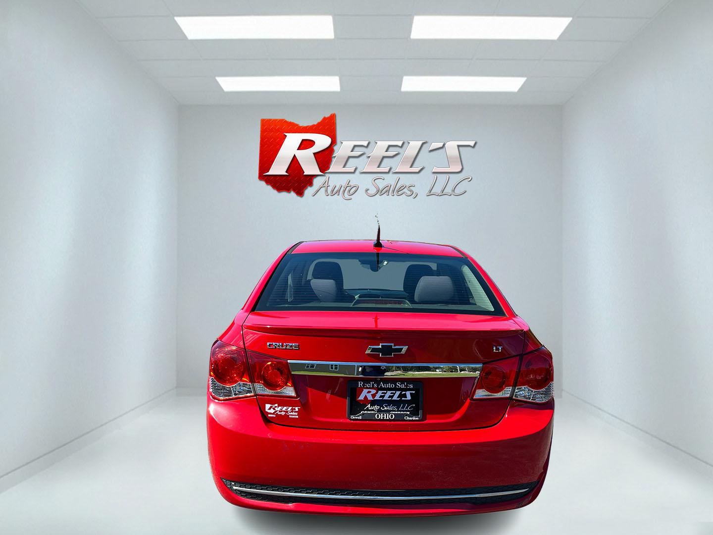 2013 Red /Black Chevrolet Cruze 1LT Auto (1G1PC5SBXD7) with an 1.4L I4 DOHC 16V TURBO engine, Automatic transmission, located at 11115 Chardon Rd. , Chardon, OH, 44024, (440) 214-9705, 41.580246, -81.241943 - 2013 Chevrolet Cruze LT – Efficient Compact Sedan with Everyday Convenience If you want a smaller sedan that is easy on fuel and easy to live with, this 2013 Chevrolet Cruze LT is a practical choice. The 1.4L Turbocharged EcoTec engine and 6-speed automatic deliver smooth everyday power and a str- Photo#8