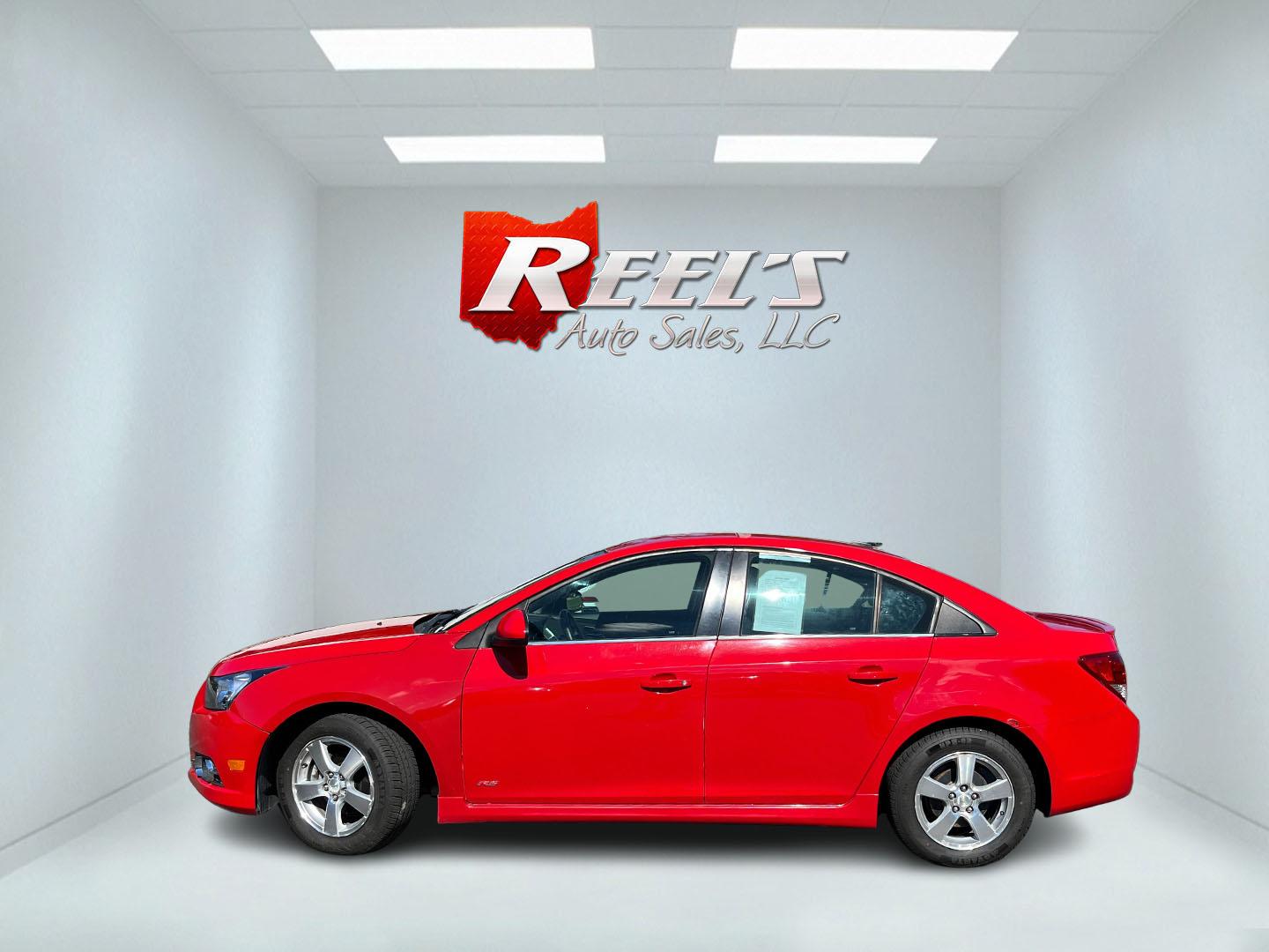 2013 Red /Black Chevrolet Cruze 1LT Auto (1G1PC5SBXD7) with an 1.4L I4 DOHC 16V TURBO engine, Automatic transmission, located at 11115 Chardon Rd. , Chardon, OH, 44024, (440) 214-9705, 41.580246, -81.241943 - 2013 Chevrolet Cruze LT – Efficient Compact Sedan with Everyday Convenience If you want a smaller sedan that is easy on fuel and easy to live with, this 2013 Chevrolet Cruze LT is a practical choice. The 1.4L Turbocharged EcoTec engine and 6-speed automatic deliver smooth everyday power and a str- Photo#11
