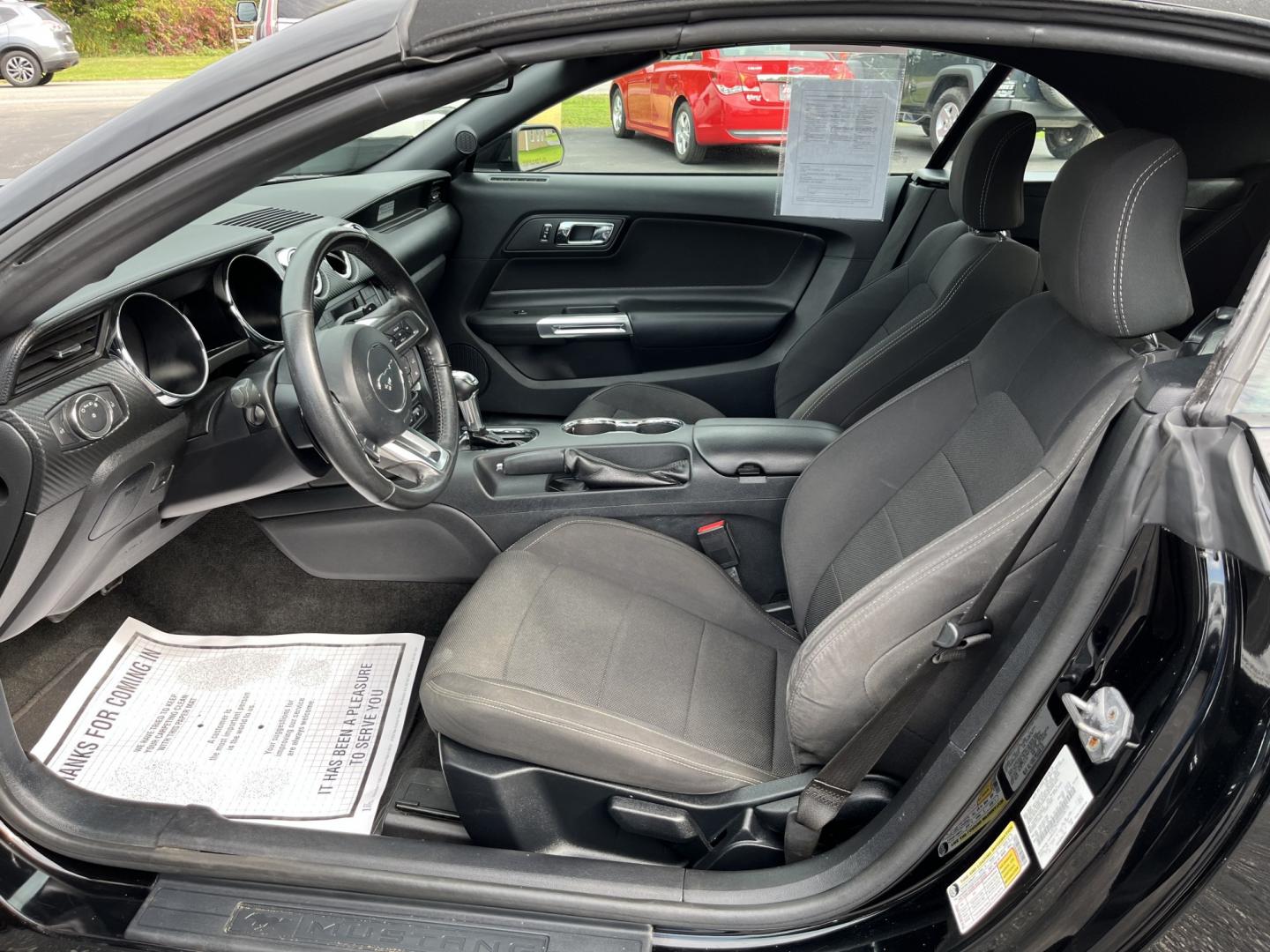 2017 Black /Black Ford Mustang V6 Convertible (1FATP8EM9H5) with an 3.7L V6 DOHC 24V engine, Automatic transmission, located at 11115 Chardon Rd. , Chardon, OH, 44024, (440) 214-9705, 41.580246, -81.241943 - 2017 Ford Mustang Convertible – Open-Air Mustang Feel with V6 Confidence Some cars get you there. A Mustang Convertible makes you want to take the long way. This 2017 Ford Mustang Convertible in Shadow Black has that classic look, with a power soft top you can drop when the weather is right. The- Photo#19