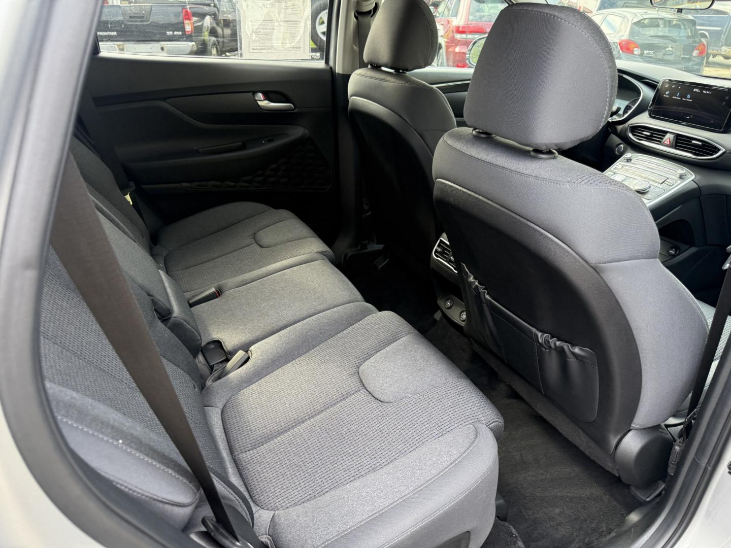 2023 Silver /Black Hyundai Santa Fe SEL AWD (5NMS2DAJ7PH) with an 2.5L I4 DOHC 16V engine, Automatic transmission, located at 547 E. Main St., Orwell, OH, 44076, (440) 437-5893, 41.535435, -80.847855 - 2023 Hyundai Santa Fe SEL AWD – Family-Ready Midsize Comfort with Fresh Tires If you want a midsize SUV that handles family life and changing weather without feeling oversized, this 2023 Hyundai Santa Fe SEL AWD is a strong fit. Finished in Shimmering Silver, with LED daytime running lights and d- Photo#40