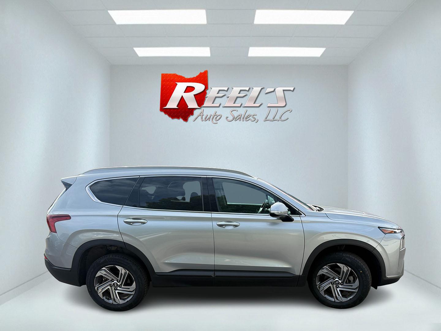 2023 Silver /Black Hyundai Santa Fe SEL AWD (5NMS2DAJ7PH) with an 2.5L I4 DOHC 16V engine, Automatic transmission, located at 547 E. Main St., Orwell, OH, 44076, (440) 437-5893, 41.535435, -80.847855 - 2023 Hyundai Santa Fe SEL AWD – Family-Ready Midsize Comfort with Fresh Tires If you want a midsize SUV that handles family life and changing weather without feeling oversized, this 2023 Hyundai Santa Fe SEL AWD is a strong fit. Finished in Shimmering Silver, with LED daytime running lights and d- Photo#6