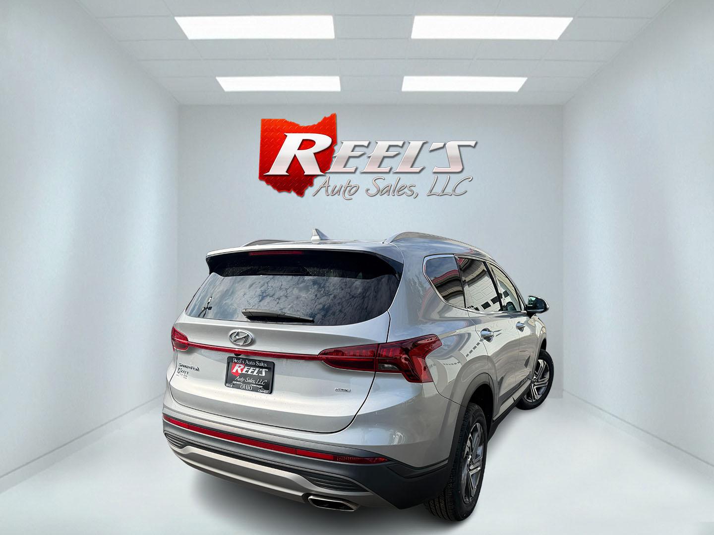 2023 Silver /Black Hyundai Santa Fe SEL AWD (5NMS2DAJ7PH) with an 2.5L I4 DOHC 16V engine, Automatic transmission, located at 547 E. Main St., Orwell, OH, 44076, (440) 437-5893, 41.535435, -80.847855 - 2023 Hyundai Santa Fe SEL AWD – Family-Ready Midsize Comfort with Fresh Tires If you want a midsize SUV that handles family life and changing weather without feeling oversized, this 2023 Hyundai Santa Fe SEL AWD is a strong fit. Finished in Shimmering Silver, with LED daytime running lights and d- Photo#8