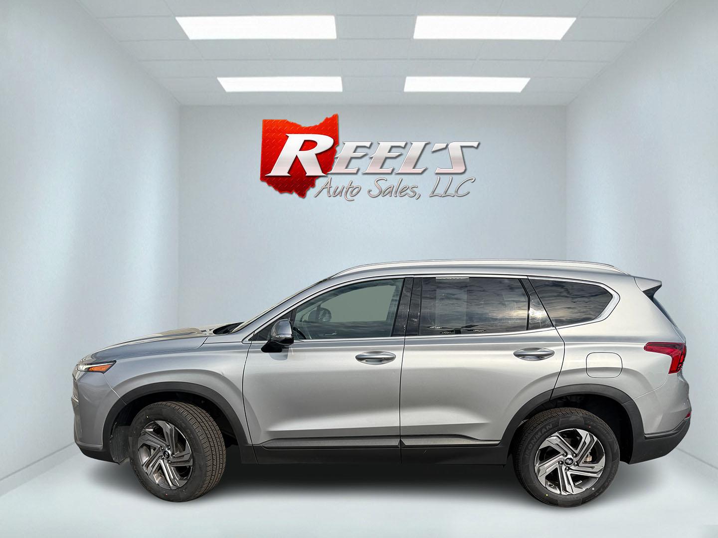 2023 Silver /Black Hyundai Santa Fe SEL AWD (5NMS2DAJ7PH) with an 2.5L I4 DOHC 16V engine, Automatic transmission, located at 547 E. Main St., Orwell, OH, 44076, (440) 437-5893, 41.535435, -80.847855 - 2023 Hyundai Santa Fe SEL AWD – Family-Ready Midsize Comfort with Fresh Tires If you want a midsize SUV that handles family life and changing weather without feeling oversized, this 2023 Hyundai Santa Fe SEL AWD is a strong fit. Finished in Shimmering Silver, with LED daytime running lights and d- Photo#13