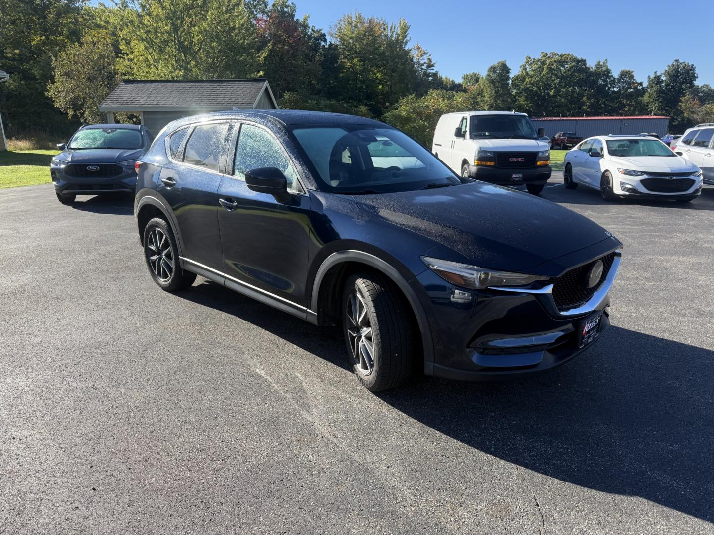 2018 Blue /Black Mazda CX-5 Grand Touring AWD (JM3KFBDM9J0) with an 2.5L I4 DOHC 16V engine, Automatc transmission, located at 11115 Chardon Rd. , Chardon, OH, 44024, (440) 214-9705, 41.580246, -81.241943 - 2018 Mazda CX-5 Grand Touring AWD – Deep Crystal Blue, Bose Sound, and That Signature Mazda Drive! This 2018 Mazda CX-5 Grand Touring AWD is the trim that makes a daily crossover feel special. Grand Touring is Mazda’s upscale statement: leather, memory seats, a power liftgate, and the kind of c- Photo#2