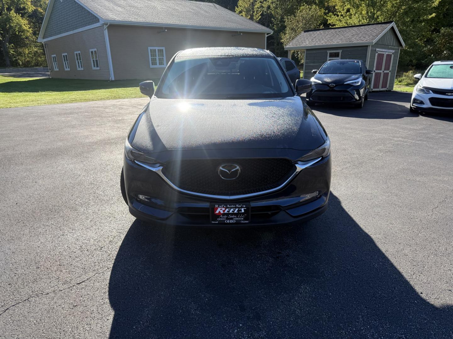 2018 Blue /Black Mazda CX-5 Grand Touring AWD (JM3KFBDM9J0) with an 2.5L I4 DOHC 16V engine, Automatc transmission, located at 11115 Chardon Rd. , Chardon, OH, 44024, (440) 214-9705, 41.580246, -81.241943 - 2018 Mazda CX-5 Grand Touring AWD – Deep Crystal Blue, Bose Sound, and That Signature Mazda Drive! This 2018 Mazda CX-5 Grand Touring AWD is the trim that makes a daily crossover feel special. Grand Touring is Mazda’s upscale statement: leather, memory seats, a power liftgate, and the kind of c- Photo#1