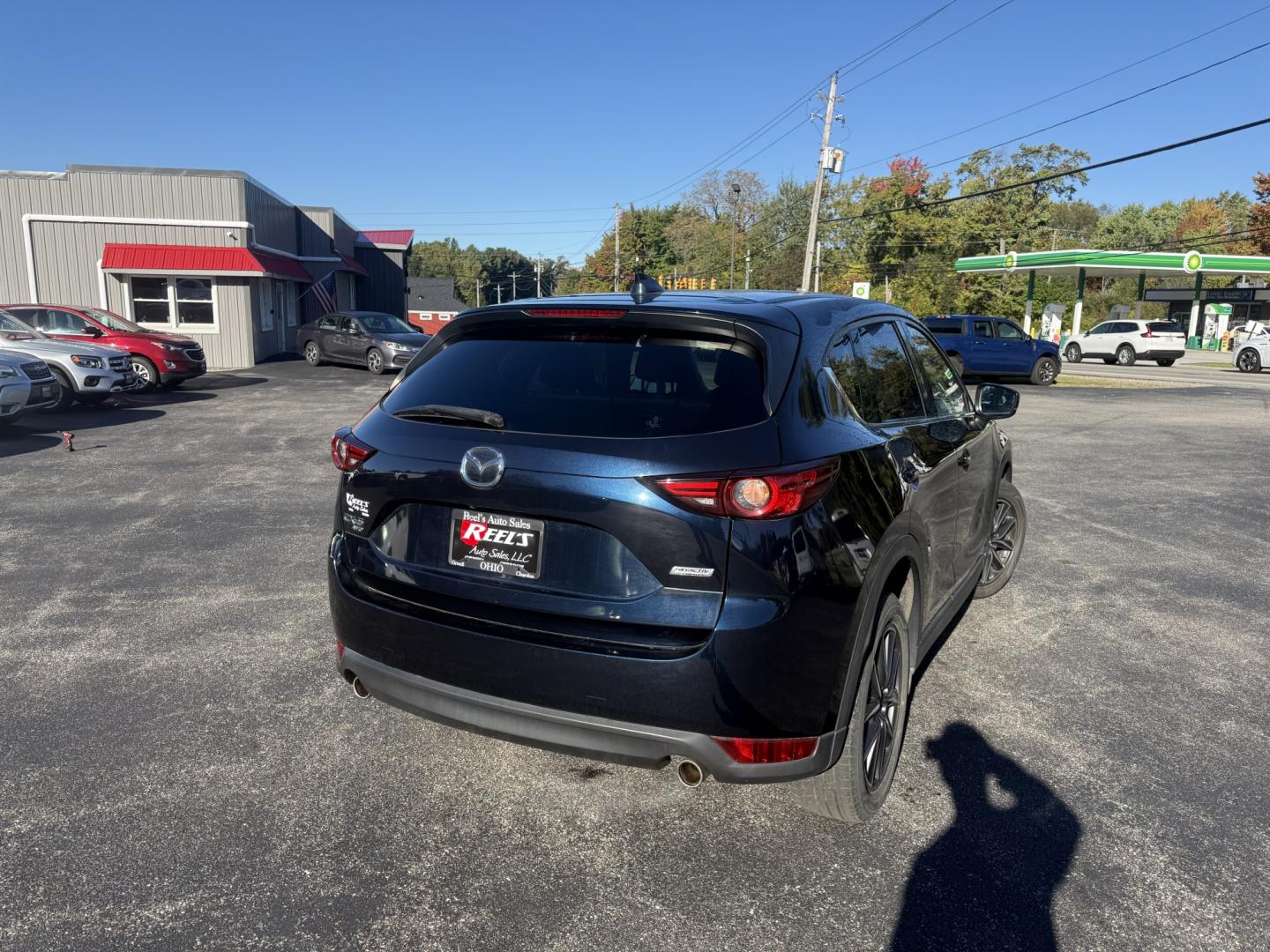 2018 Blue /Black Mazda CX-5 Grand Touring AWD (JM3KFBDM9J0) with an 2.5L I4 DOHC 16V engine, Automatc transmission, located at 11115 Chardon Rd. , Chardon, OH, 44024, (440) 214-9705, 41.580246, -81.241943 - 2018 Mazda CX-5 Grand Touring AWD – Deep Crystal Blue, Bose Sound, and That Signature Mazda Drive! This 2018 Mazda CX-5 Grand Touring AWD is the trim that makes a daily crossover feel special. Grand Touring is Mazda’s upscale statement: leather, memory seats, a power liftgate, and the kind of c- Photo#33