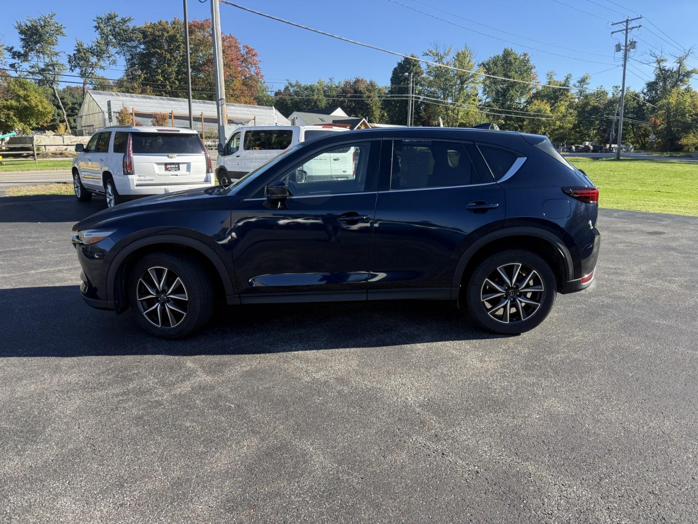 2018 Blue /Black Mazda CX-5 Grand Touring AWD (JM3KFBDM9J0) with an 2.5L I4 DOHC 16V engine, Automatc transmission, located at 11115 Chardon Rd. , Chardon, OH, 44024, (440) 214-9705, 41.580246, -81.241943 - 2018 Mazda CX-5 Grand Touring AWD – Deep Crystal Blue, Bose Sound, and That Signature Mazda Drive! This 2018 Mazda CX-5 Grand Touring AWD is the trim that makes a daily crossover feel special. Grand Touring is Mazda’s upscale statement: leather, memory seats, a power liftgate, and the kind of c- Photo#38