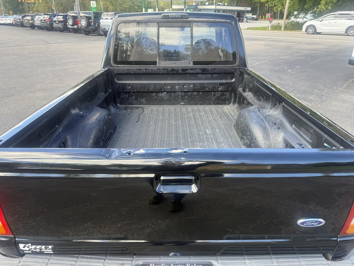 1993 Black /Tan Ford Ranger XLT SuperCab 4WD (1FTCR15X8PP) with an 4.0L V6 OHV 12V engine, Automatic transmission, located at 11115 Chardon Rd. , Chardon, OH, 44024, (440) 214-9705, 41.580246, -81.241943- Photo#12