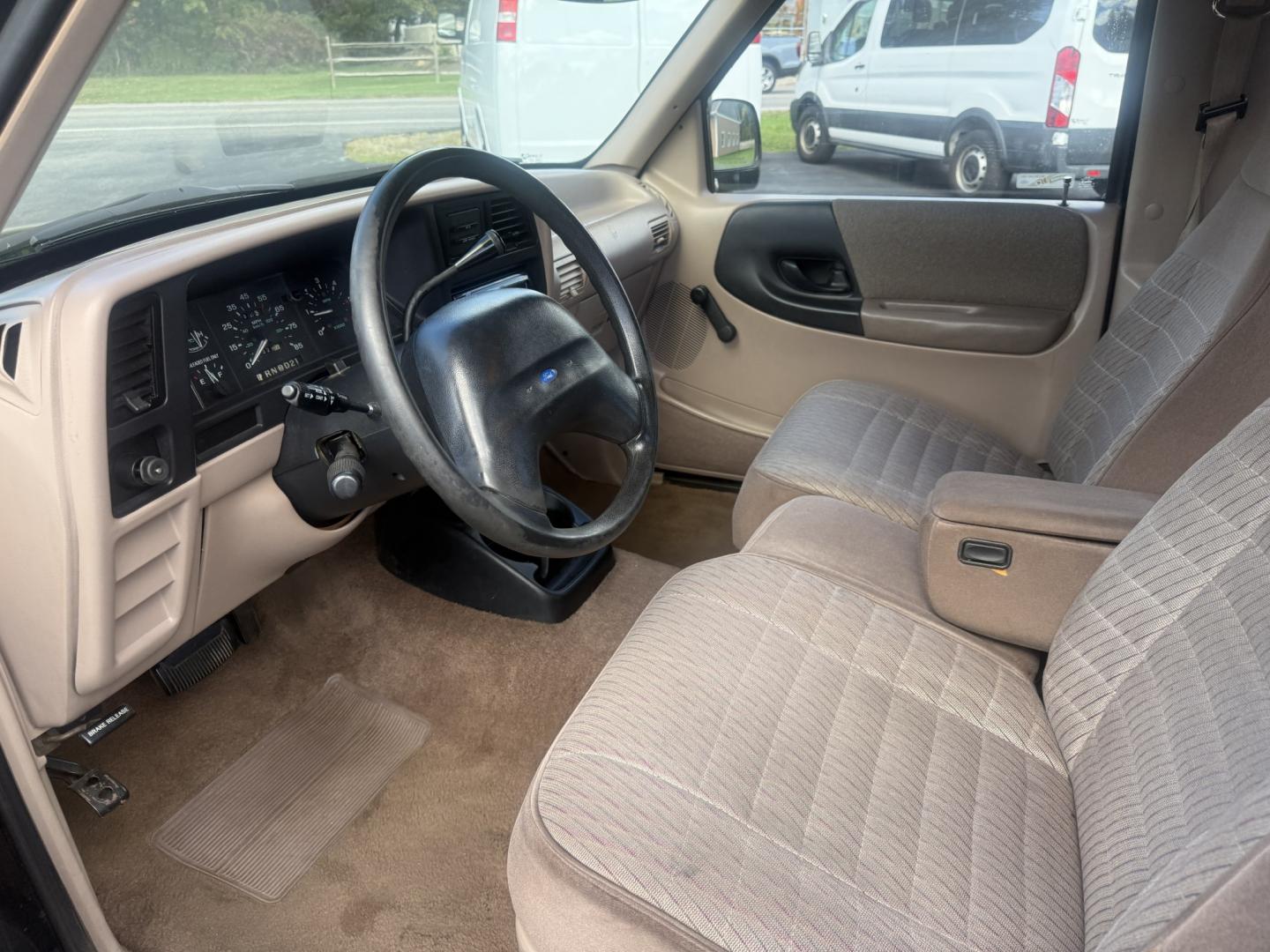 1993 Black /Tan Ford Ranger XLT SuperCab 4WD (1FTCR15X8PP) with an 4.0L V6 OHV 12V engine, Automatic transmission, located at 11115 Chardon Rd. , Chardon, OH, 44024, (440) 214-9705, 41.580246, -81.241943- Photo#19