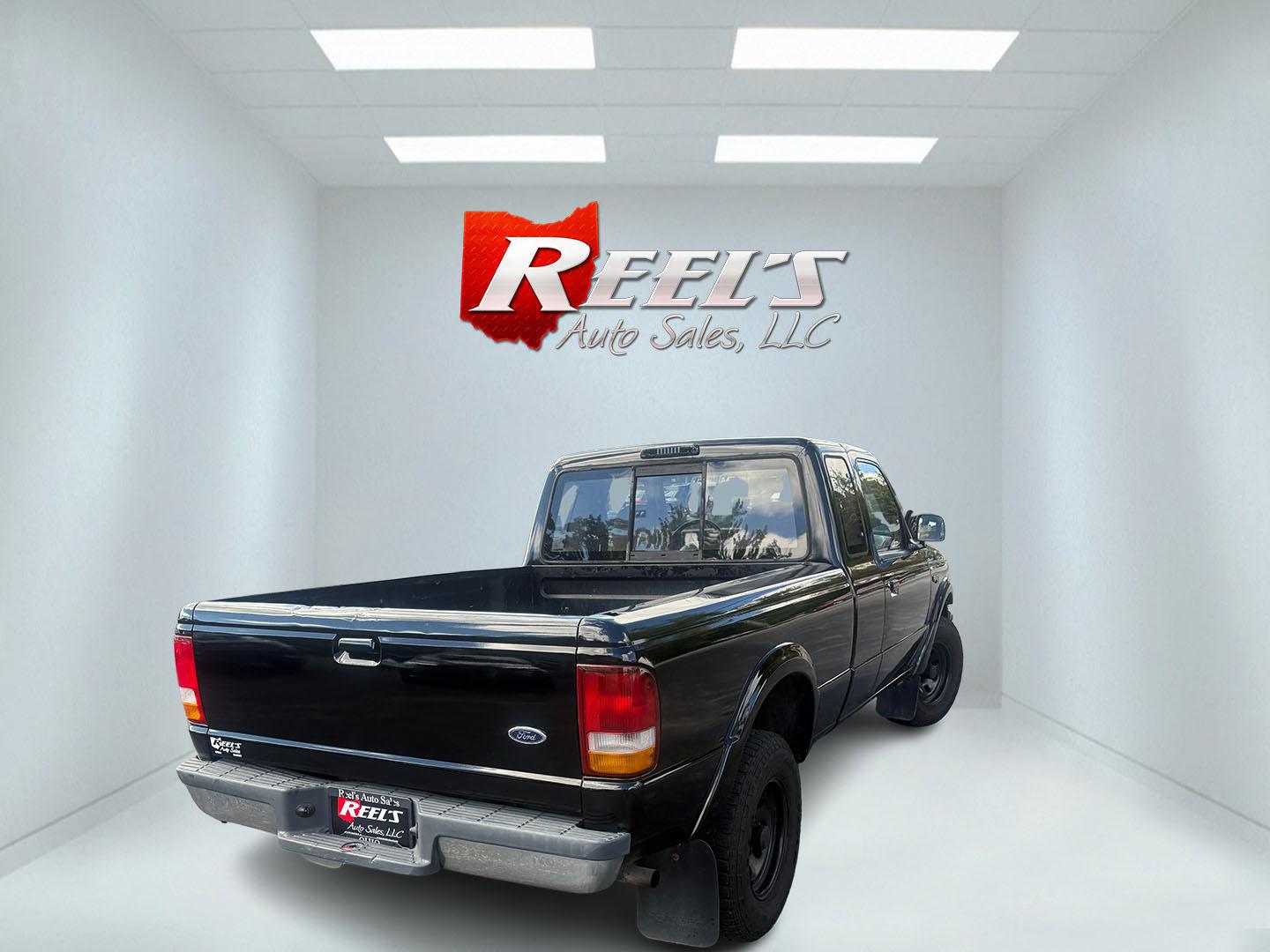 1993 Black /Tan Ford Ranger XLT SuperCab 4WD (1FTCR15X8PP) with an 4.0L V6 OHV 12V engine, Automatic transmission, located at 11115 Chardon Rd. , Chardon, OH, 44024, (440) 214-9705, 41.580246, -81.241943- Photo#10