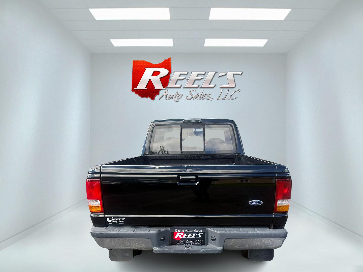 1993 Black /Tan Ford Ranger XLT SuperCab 4WD (1FTCR15X8PP) with an 4.0L V6 OHV 12V engine, Automatic transmission, located at 11115 Chardon Rd. , Chardon, OH, 44024, (440) 214-9705, 41.580246, -81.241943- Photo#11
