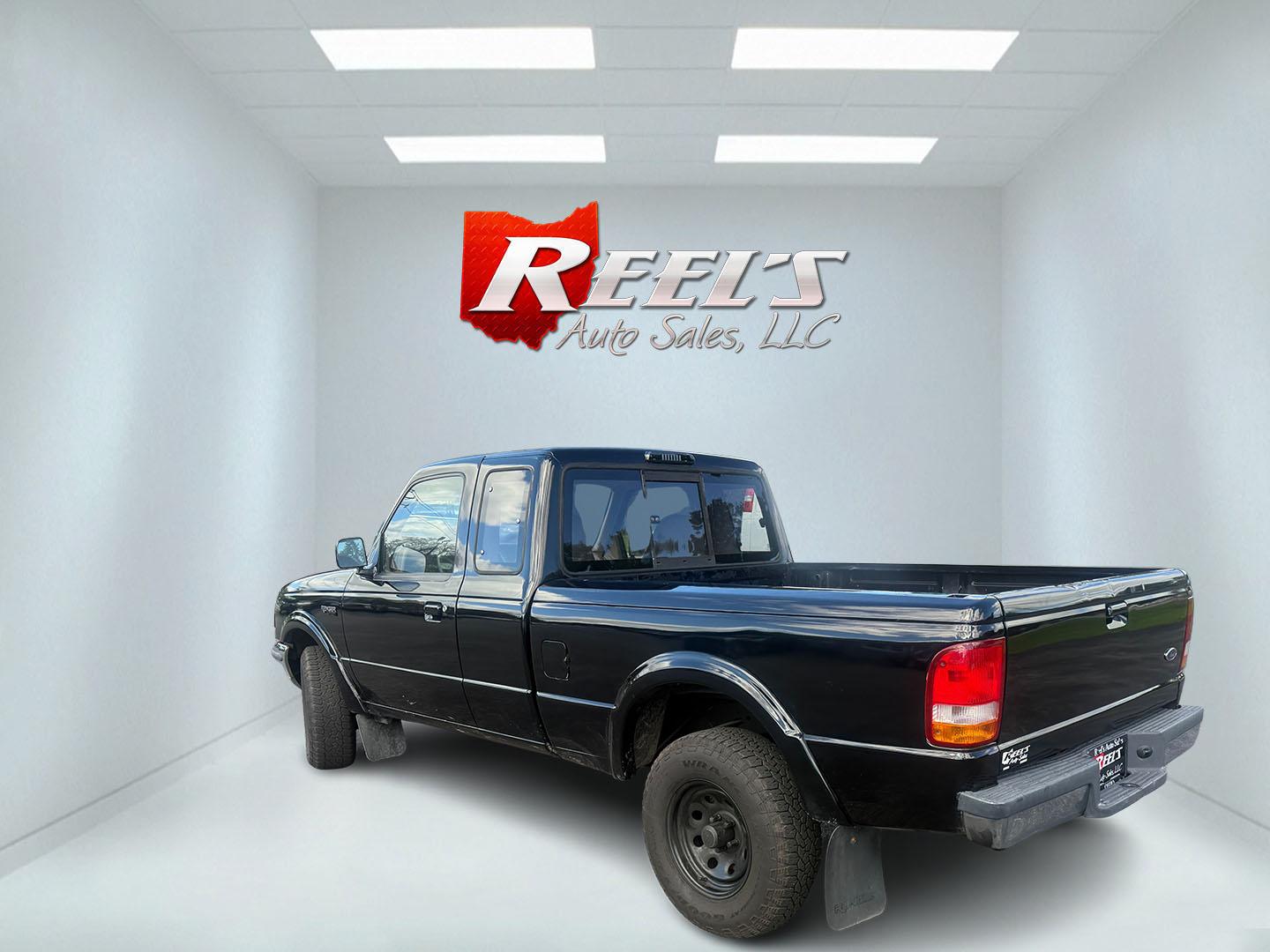 1993 Black /Tan Ford Ranger XLT SuperCab 4WD (1FTCR15X8PP) with an 4.0L V6 OHV 12V engine, Automatic transmission, located at 11115 Chardon Rd. , Chardon, OH, 44024, (440) 214-9705, 41.580246, -81.241943- Photo#13