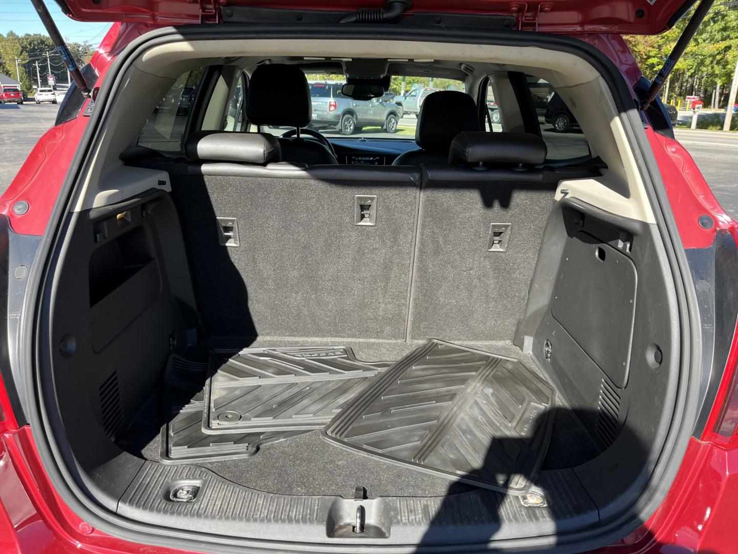 2019 Red /Black Buick Encore Essence AWD (KL4CJGSB4KB) with an 1.4L I4 DOHC 16V TURBO engine, 6A transmission, located at 11115 Chardon Rd. , Chardon, OH, 44024, (440) 214-9705, 41.580246, -81.241943- Photo#14