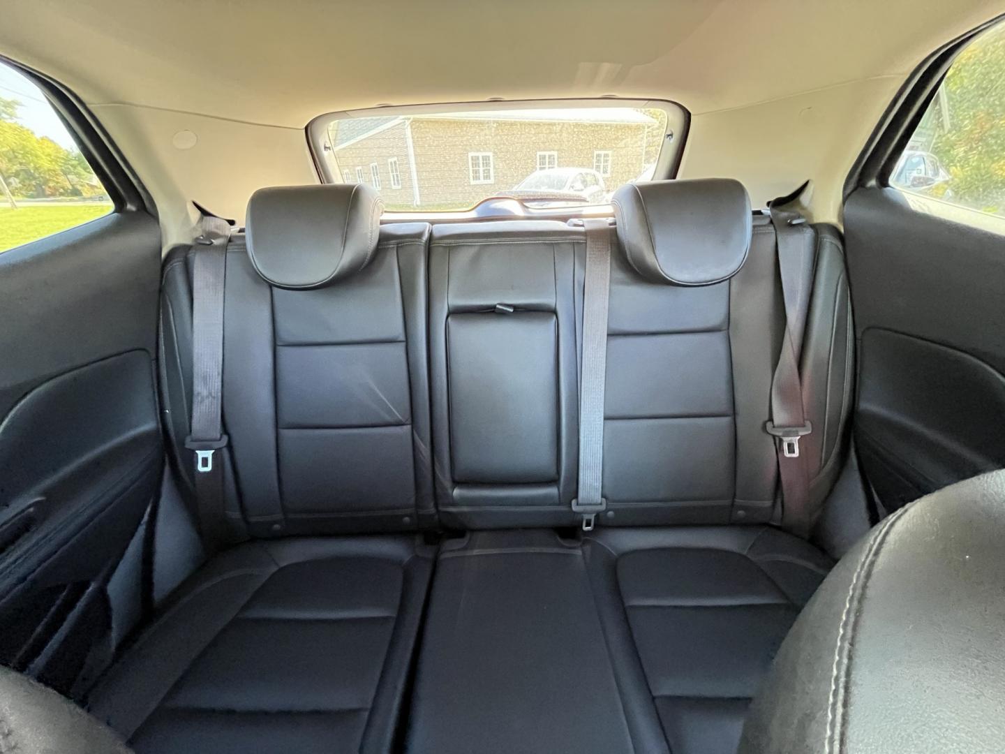 2019 Red /Black Buick Encore Essence AWD (KL4CJGSB4KB) with an 1.4L I4 DOHC 16V TURBO engine, 6A transmission, located at 11115 Chardon Rd. , Chardon, OH, 44024, (440) 214-9705, 41.580246, -81.241943- Photo#29