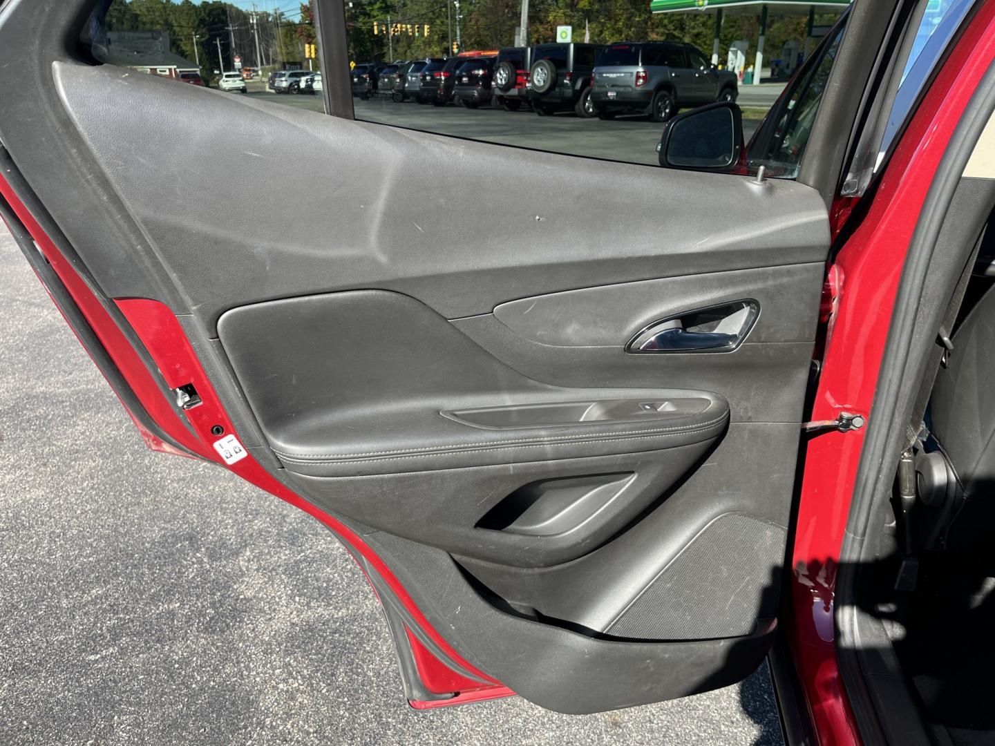 2019 Red /Black Buick Encore Essence AWD (KL4CJGSB4KB) with an 1.4L I4 DOHC 16V TURBO engine, 6A transmission, located at 11115 Chardon Rd. , Chardon, OH, 44024, (440) 214-9705, 41.580246, -81.241943- Photo#30