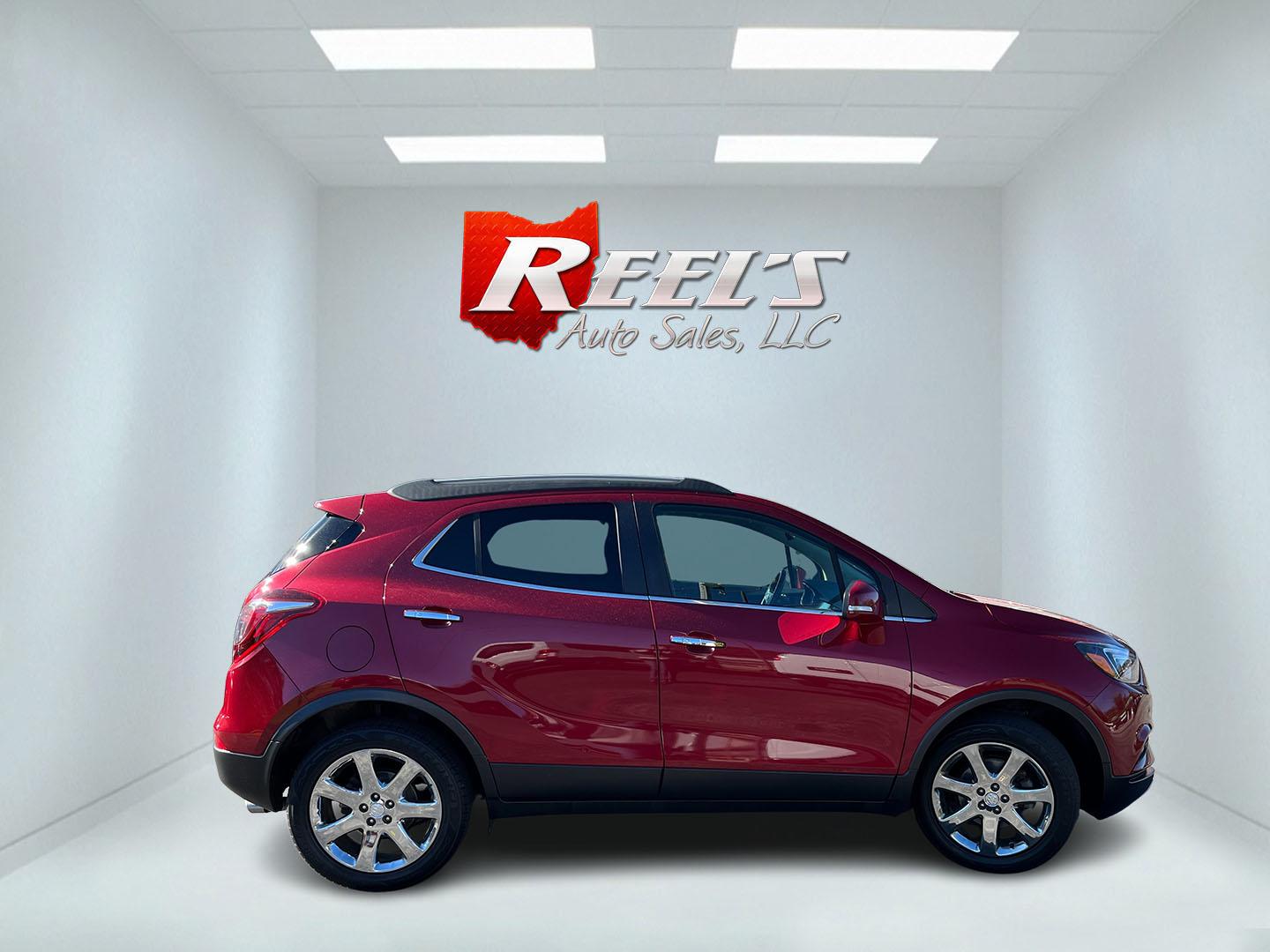 2019 Red /Black Buick Encore Essence AWD (KL4CJGSB4KB) with an 1.4L I4 DOHC 16V TURBO engine, 6A transmission, located at 11115 Chardon Rd. , Chardon, OH, 44024, (440) 214-9705, 41.580246, -81.241943- Photo#5