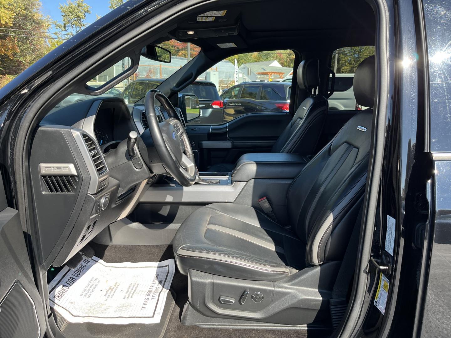 2018 Black /Black Ford F-150 Platinum SuperCrew 5.5-ft. Bed 4WD (1FTEW1EG1JF) with an 3.5L V6 DOHC 24V TWIN TURBO engine, Automatic transmission, located at 11115 Chardon Rd. , Chardon, OH, 44024, (440) 214-9705, 41.580246, -81.241943 - 2018 Ford F-150 Platinum Crew Cab 4WD – Luxury Image with Real Capability Platinum is the F-150 that people notice. This 2018 4WD model is finished in Shadow Black on 20" aluminum wheels, with full LED exterior lighting, and it carries the stance and equipment that separate it from a standard cre- Photo#17