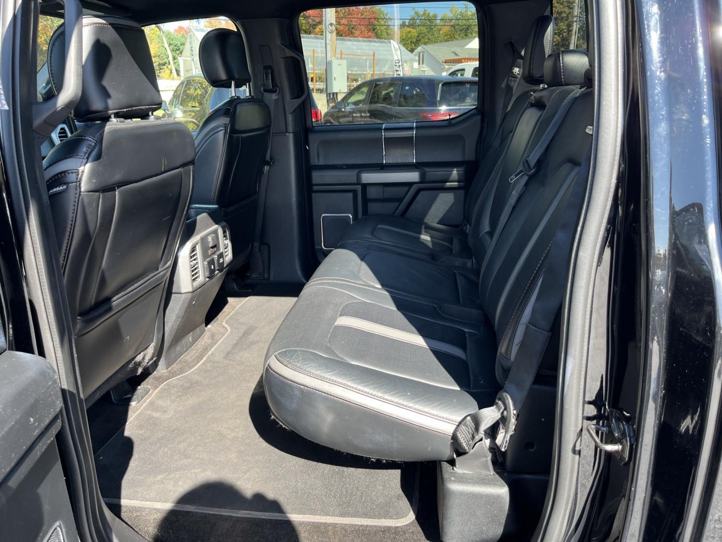 2018 Black /Black Ford F-150 Platinum SuperCrew 5.5-ft. Bed 4WD (1FTEW1EG1JF) with an 3.5L V6 DOHC 24V TWIN TURBO engine, Automatic transmission, located at 11115 Chardon Rd. , Chardon, OH, 44024, (440) 214-9705, 41.580246, -81.241943 - 2018 Ford F-150 Platinum Crew Cab 4WD – Luxury Image with Real Capability Platinum is the F-150 that people notice. This 2018 4WD model is finished in Shadow Black on 20" aluminum wheels, with full LED exterior lighting, and it carries the stance and equipment that separate it from a standard cre- Photo#33