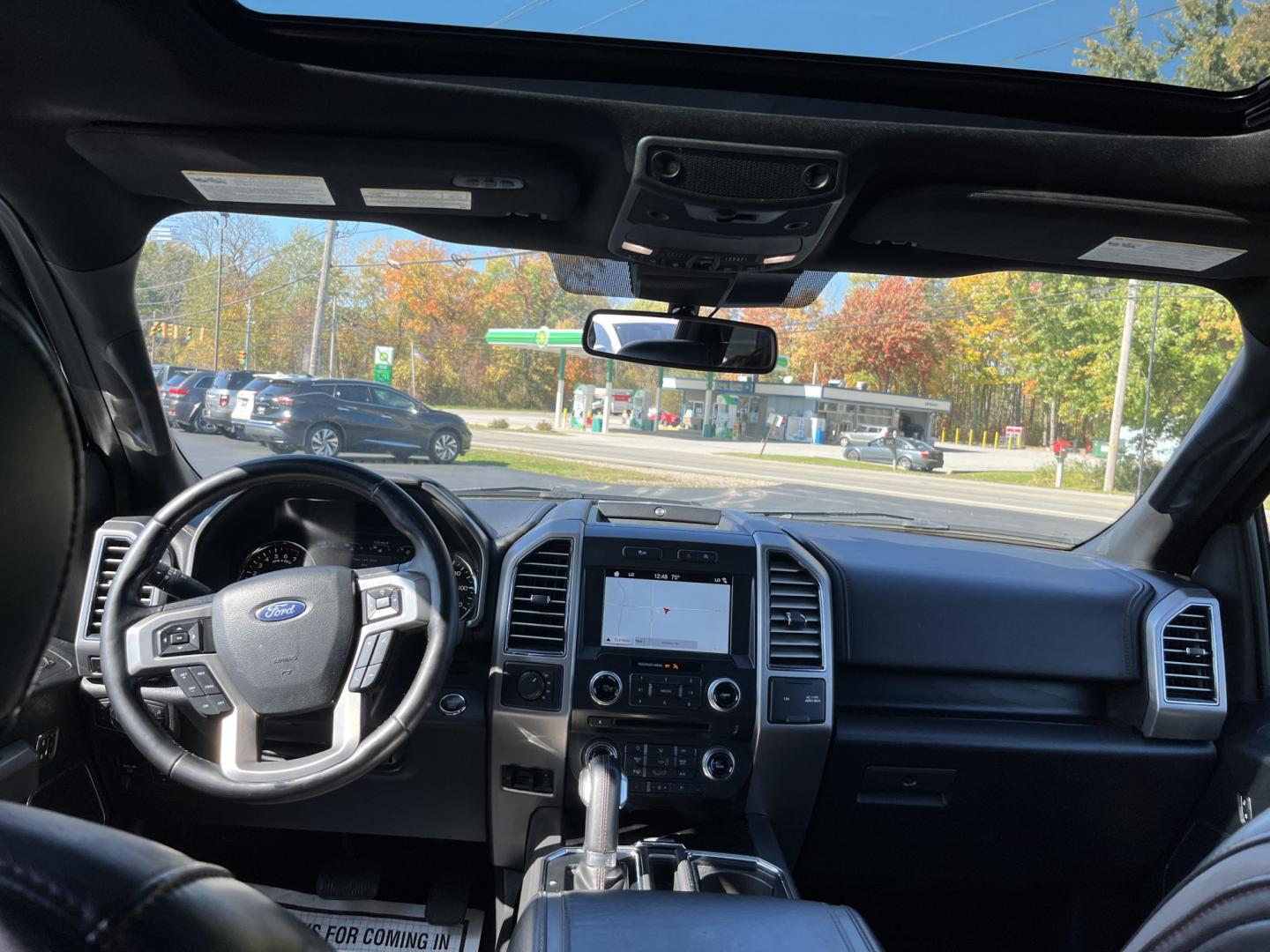 2018 Black /Black Ford F-150 Platinum SuperCrew 5.5-ft. Bed 4WD (1FTEW1EG1JF) with an 3.5L V6 DOHC 24V TWIN TURBO engine, Automatic transmission, located at 11115 Chardon Rd. , Chardon, OH, 44024, (440) 214-9705, 41.580246, -81.241943 - 2018 Ford F-150 Platinum Crew Cab 4WD – Luxury Image with Real Capability Platinum is the F-150 that people notice. This 2018 4WD model is finished in Shadow Black on 20" aluminum wheels, with full LED exterior lighting, and it carries the stance and equipment that separate it from a standard cre- Photo#34