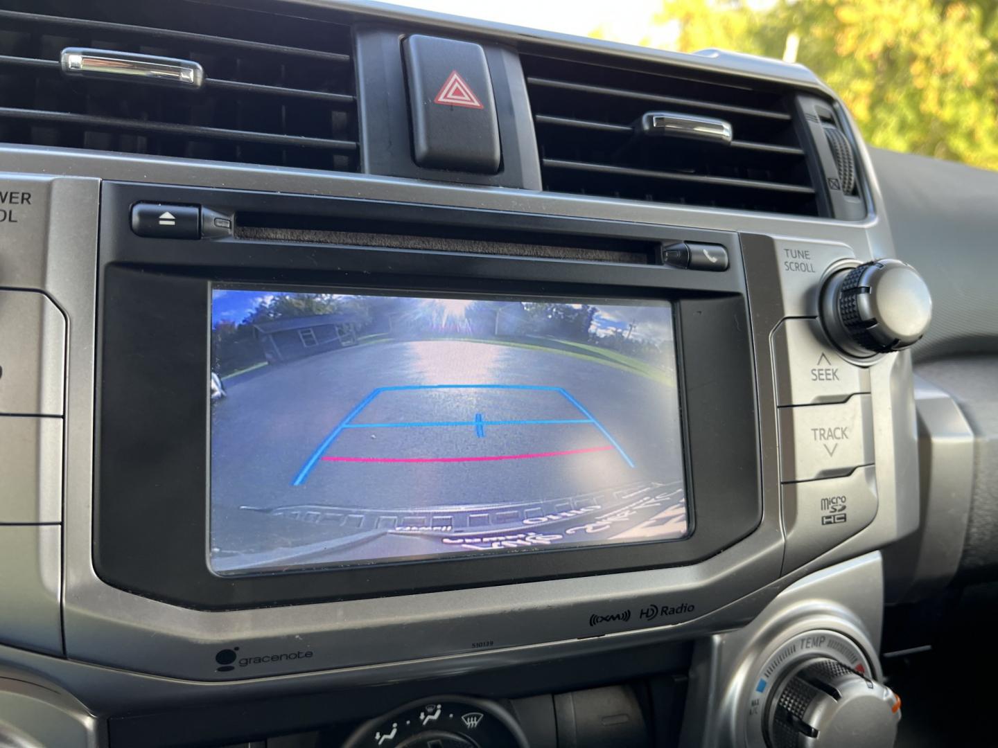 2016 Black /Black Toyota 4Runner SR5 4WD (JTEBU5JR9G5) with an 4.0L V6 DOHC 24V engine, Automatic transmission, located at 11115 Chardon Rd. , Chardon, OH, 44024, (440) 214-9705, 41.580246, -81.241943 - 2016 Toyota 4Runner SR5 Premium 4WD – Body-on-Frame Capability with a Third Row The 4Runner has stayed popular for a reason. This 2016 SR5 Premium 4WD is finished in Midnight Black Metallic and keeps the solid, upright look that still stands out from the crossover crowd. The 4.0L V6 and 5-speed a- Photo#27