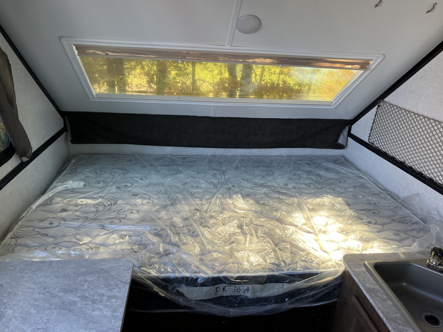 2021 White /Black Forest River Flagstaff Camping Trailer (4X4CFS217MD) , located at 11115 Chardon Rd. , Chardon, OH, 44024, (440) 214-9705, 41.580246, -81.241943- Photo#6
