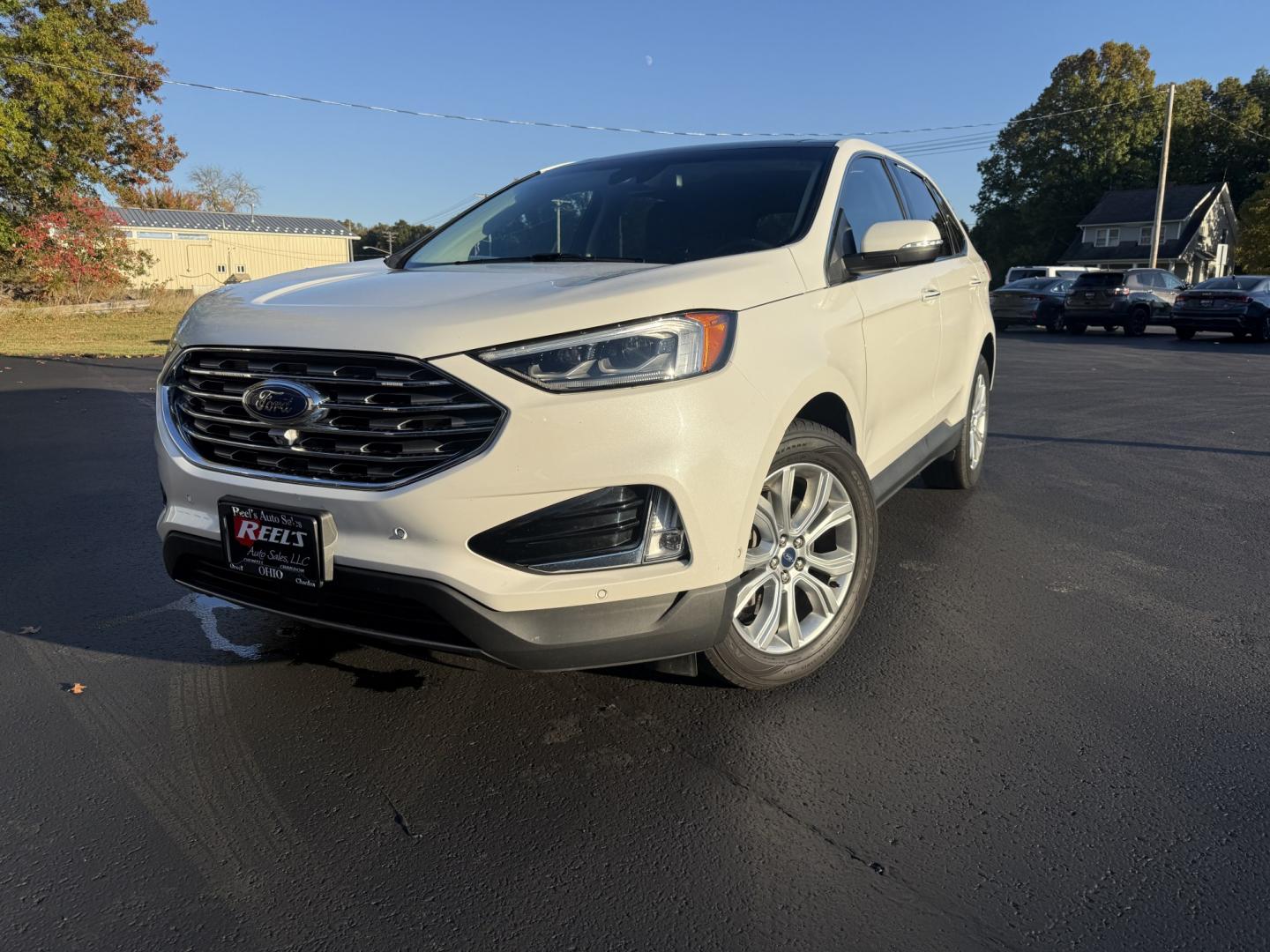 2021 White /Black Ford Edge Titanium AWD (2FMPK4K92MB) with an 2.0L I4 DOHC 16V TURBO engine, Automatic transmission, located at 547 E. Main St., Orwell, OH, 44076, (440) 437-5893, 41.535435, -80.847855- Photo#0