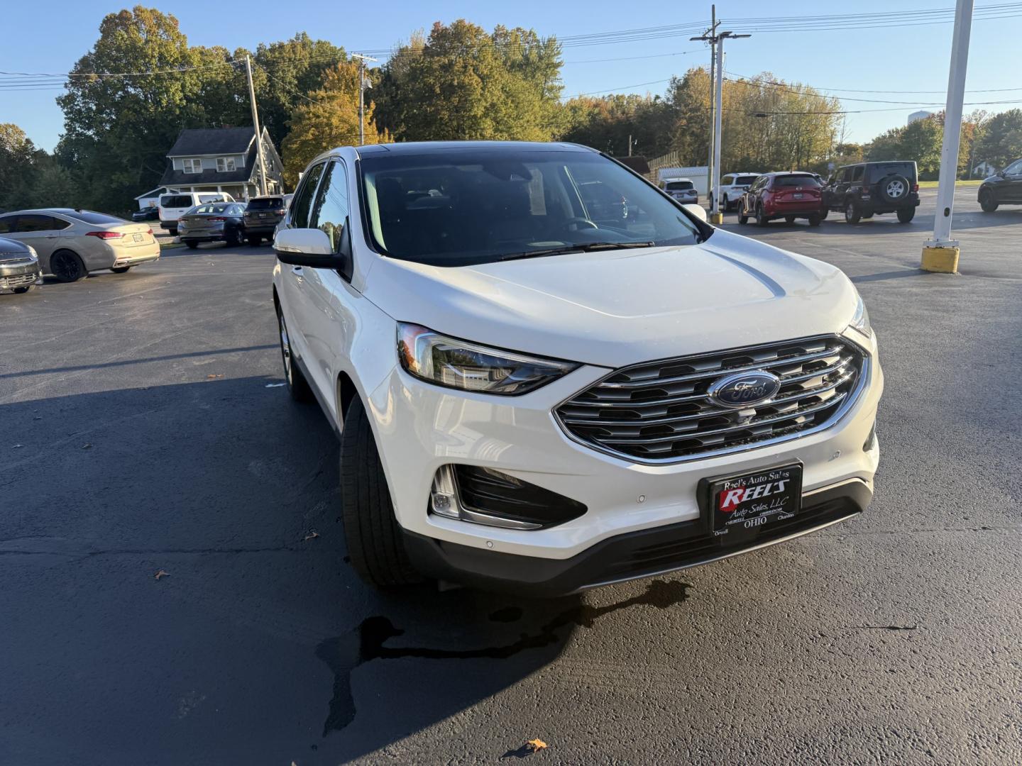 2021 White /Black Ford Edge Titanium AWD (2FMPK4K92MB) with an 2.0L I4 DOHC 16V TURBO engine, Automatic transmission, located at 547 E. Main St., Orwell, OH, 44076, (440) 437-5893, 41.535435, -80.847855- Photo#2