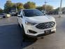 2021 White /Black Ford Edge Titanium AWD (2FMPK4K92MB) with an 2.0L I4 DOHC 16V TURBO engine, Automatic transmission, located at 547 E. Main St., Orwell, OH, 44076, (440) 437-5893, 41.535435, -80.847855- Photo#2