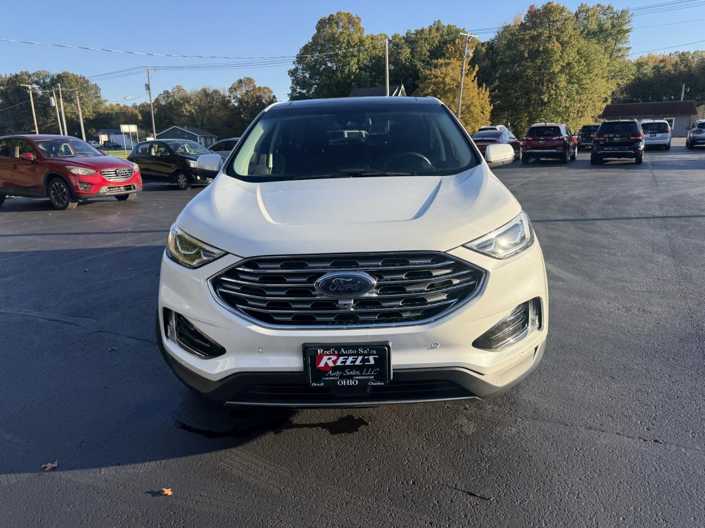 2021 White /Black Ford Edge Titanium AWD (2FMPK4K92MB) with an 2.0L I4 DOHC 16V TURBO engine, Automatic transmission, located at 547 E. Main St., Orwell, OH, 44076, (440) 437-5893, 41.535435, -80.847855- Photo#1