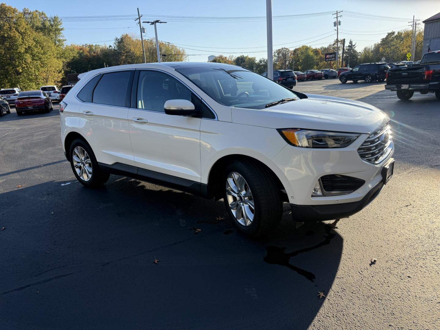 2021 White /Black Ford Edge Titanium AWD (2FMPK4K92MB) with an 2.0L I4 DOHC 16V TURBO engine, Automatic transmission, located at 547 E. Main St., Orwell, OH, 44076, (440) 437-5893, 41.535435, -80.847855- Photo#3