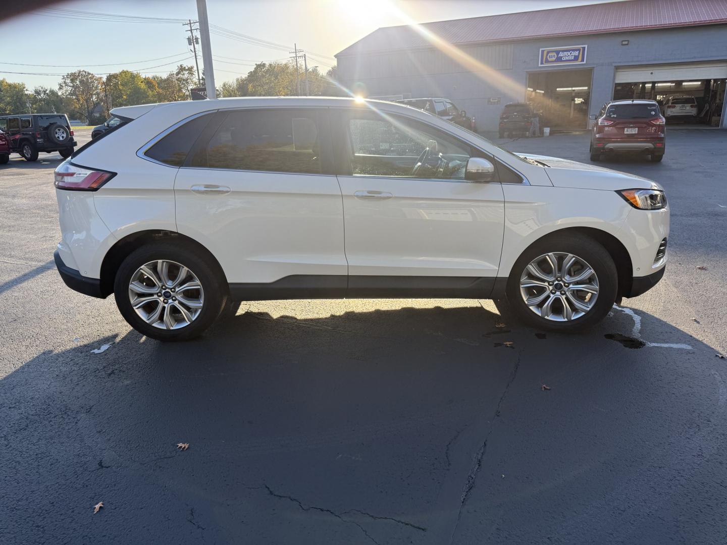 2021 White /Black Ford Edge Titanium AWD (2FMPK4K92MB) with an 2.0L I4 DOHC 16V TURBO engine, Automatic transmission, located at 547 E. Main St., Orwell, OH, 44076, (440) 437-5893, 41.535435, -80.847855- Photo#32