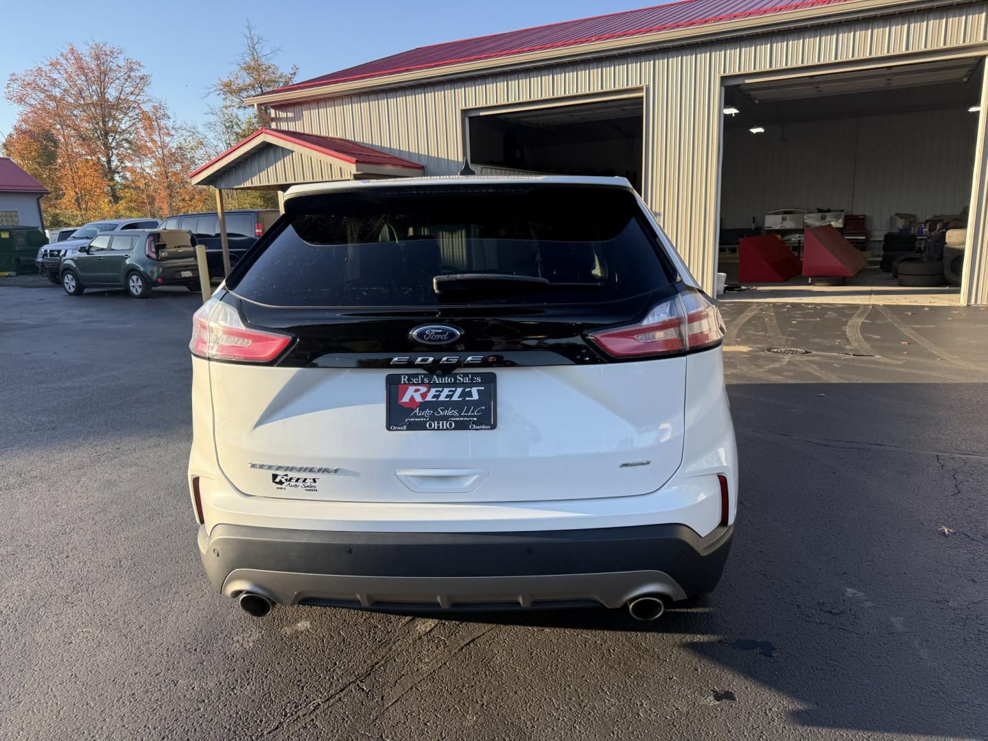 2021 White /Black Ford Edge Titanium AWD (2FMPK4K92MB) with an 2.0L I4 DOHC 16V TURBO engine, Automatic transmission, located at 547 E. Main St., Orwell, OH, 44076, (440) 437-5893, 41.535435, -80.847855- Photo#35