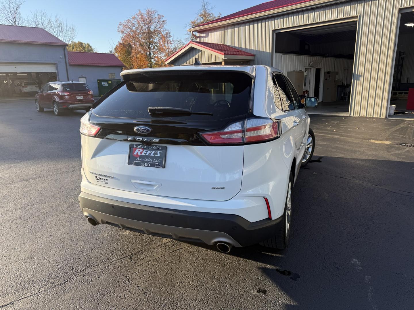 2021 White /Black Ford Edge Titanium AWD (2FMPK4K92MB) with an 2.0L I4 DOHC 16V TURBO engine, Automatic transmission, located at 547 E. Main St., Orwell, OH, 44076, (440) 437-5893, 41.535435, -80.847855- Photo#34