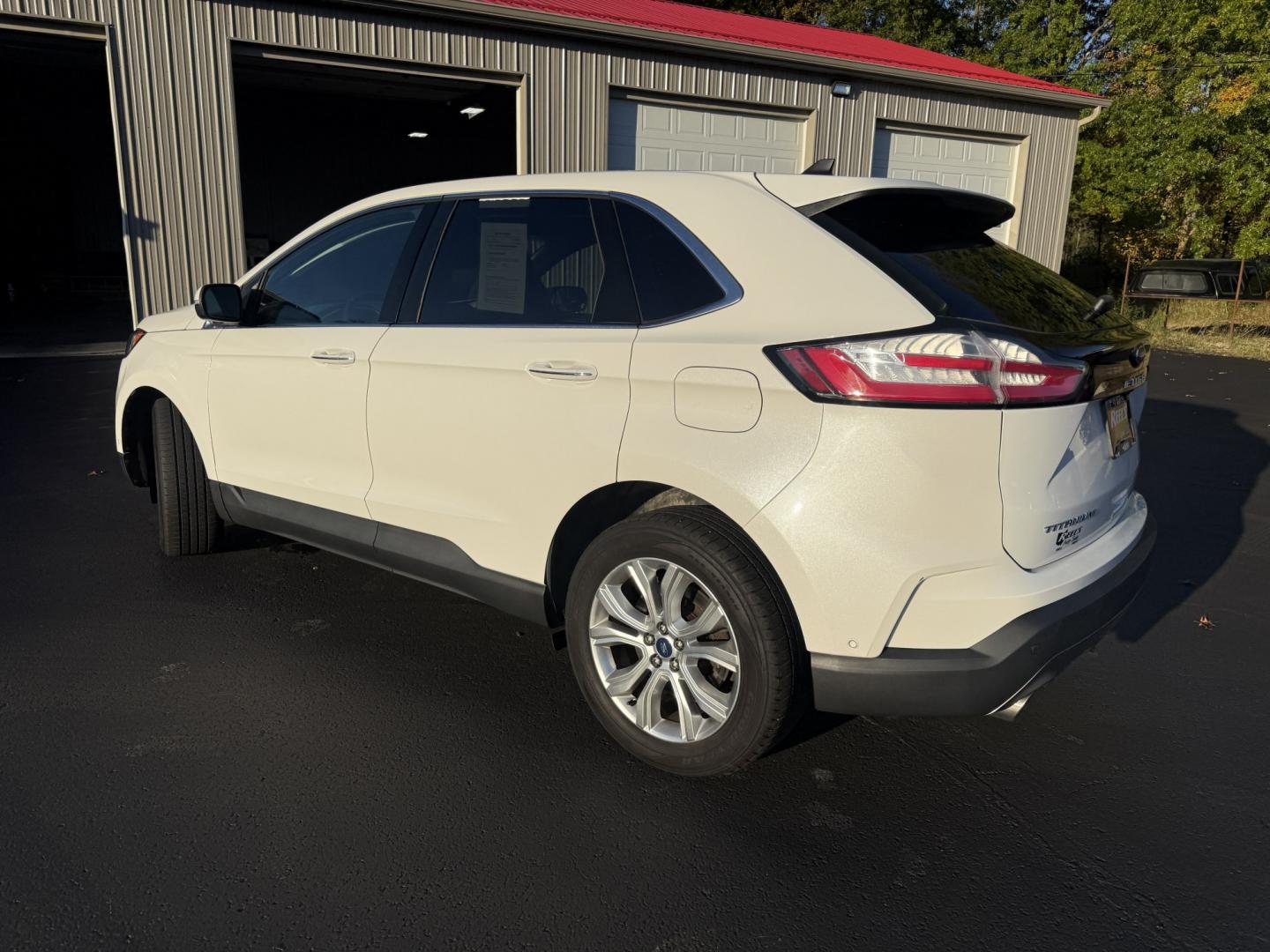 2021 White /Black Ford Edge Titanium AWD (2FMPK4K92MB) with an 2.0L I4 DOHC 16V TURBO engine, Automatic transmission, located at 547 E. Main St., Orwell, OH, 44076, (440) 437-5893, 41.535435, -80.847855- Photo#38