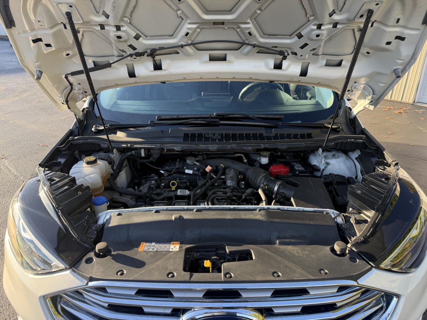 2021 White /Black Ford Edge Titanium AWD (2FMPK4K92MB) with an 2.0L I4 DOHC 16V TURBO engine, Automatic transmission, located at 547 E. Main St., Orwell, OH, 44076, (440) 437-5893, 41.535435, -80.847855- Photo#6