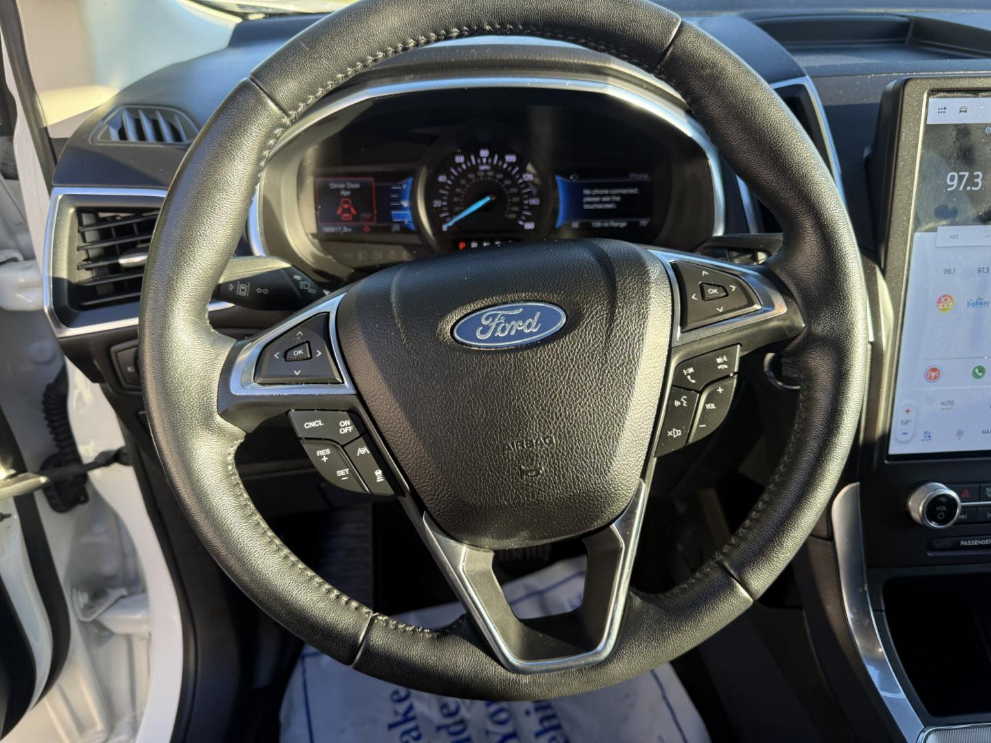 2021 White /Black Ford Edge Titanium AWD (2FMPK4K92MB) with an 2.0L I4 DOHC 16V TURBO engine, Automatic transmission, located at 547 E. Main St., Orwell, OH, 44076, (440) 437-5893, 41.535435, -80.847855- Photo#14